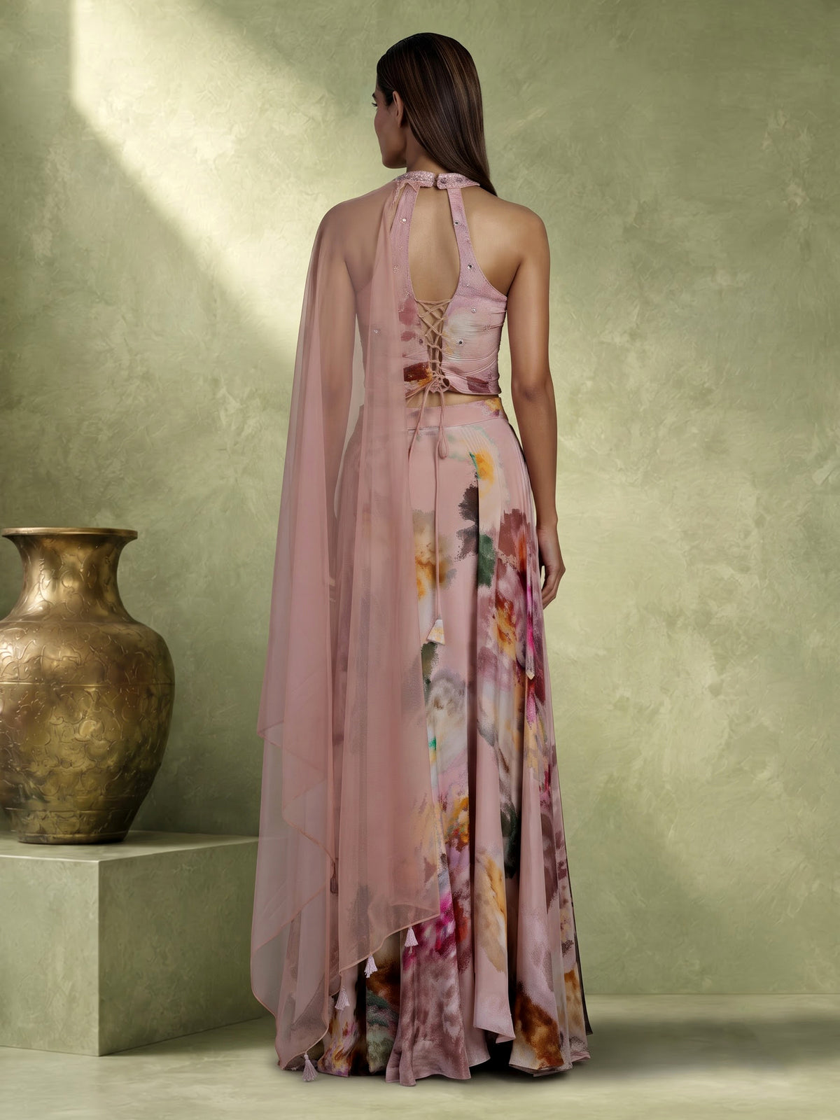 Peach silk halter neck palazzo suit with embellished top and dupatta