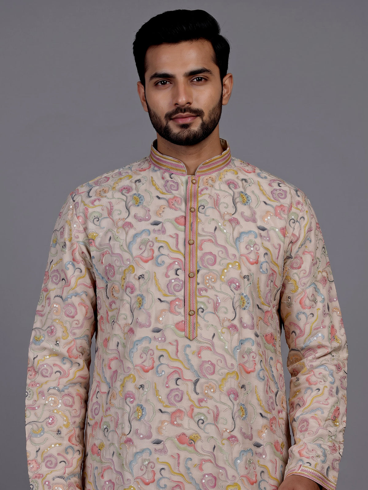 Off white embroidered kurta suit with pastel floral print