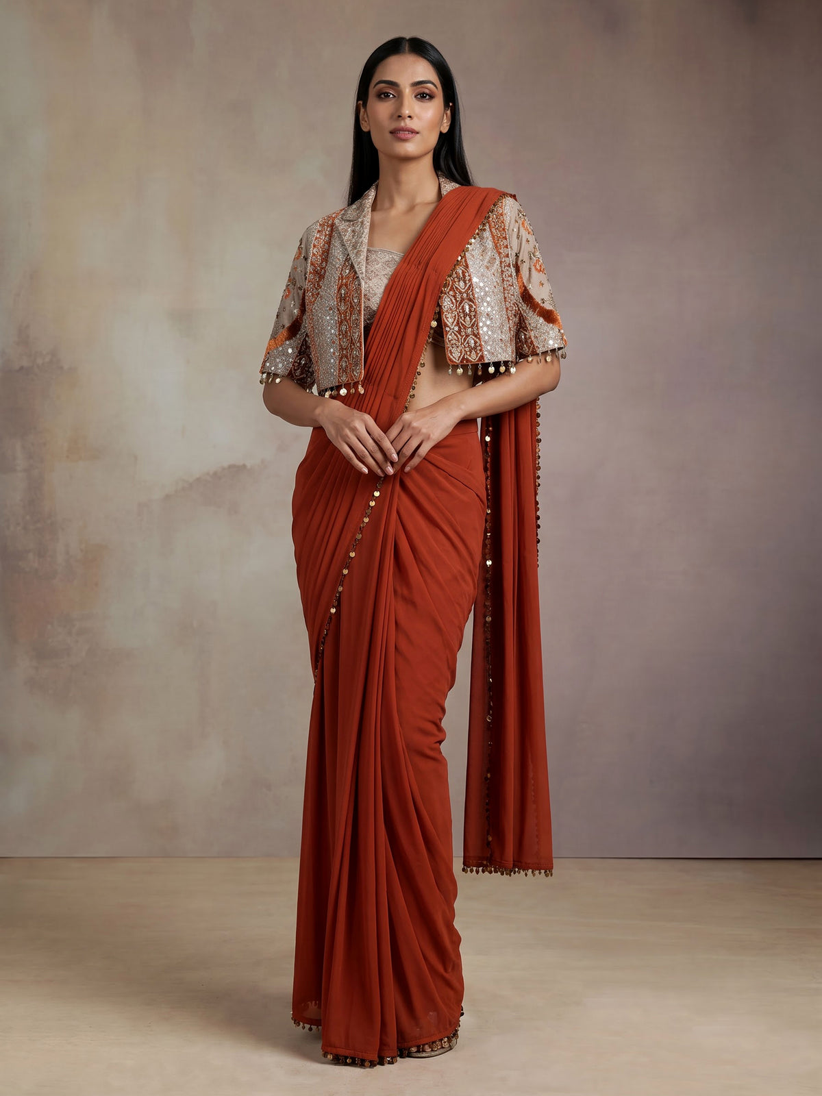 Regal deep orange ready-to-wear saree with embellished jacket blouse