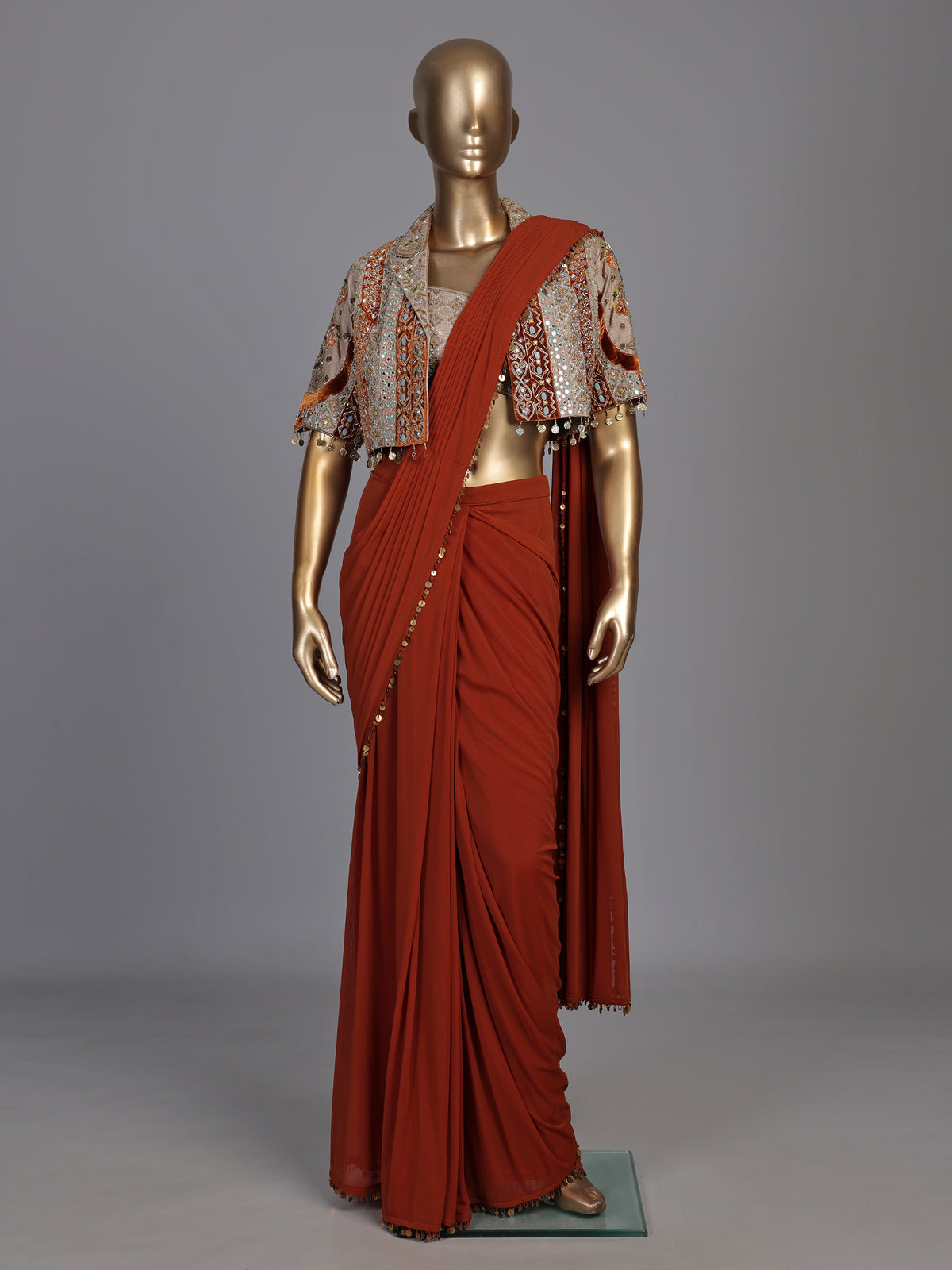 Regal deep orange ready-to-wear saree with embellished jacket blouse