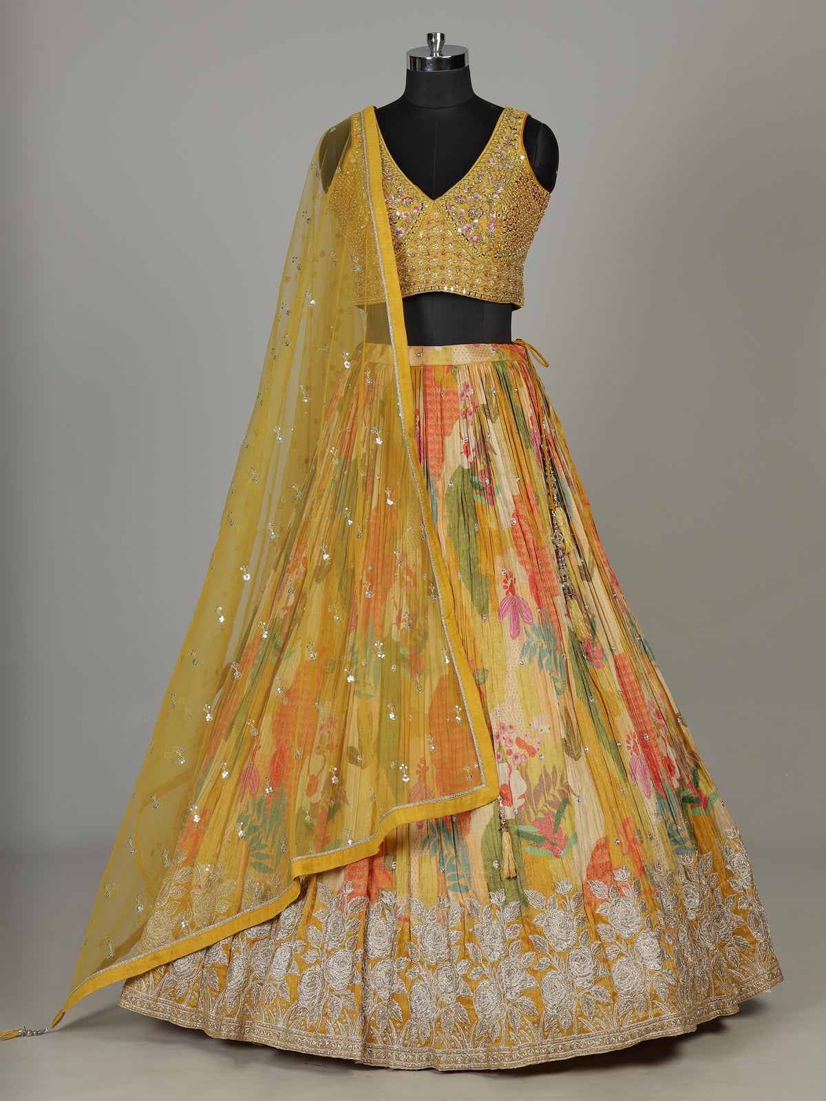 Mustard yellow floral silk lehenga choli with designer embellishments