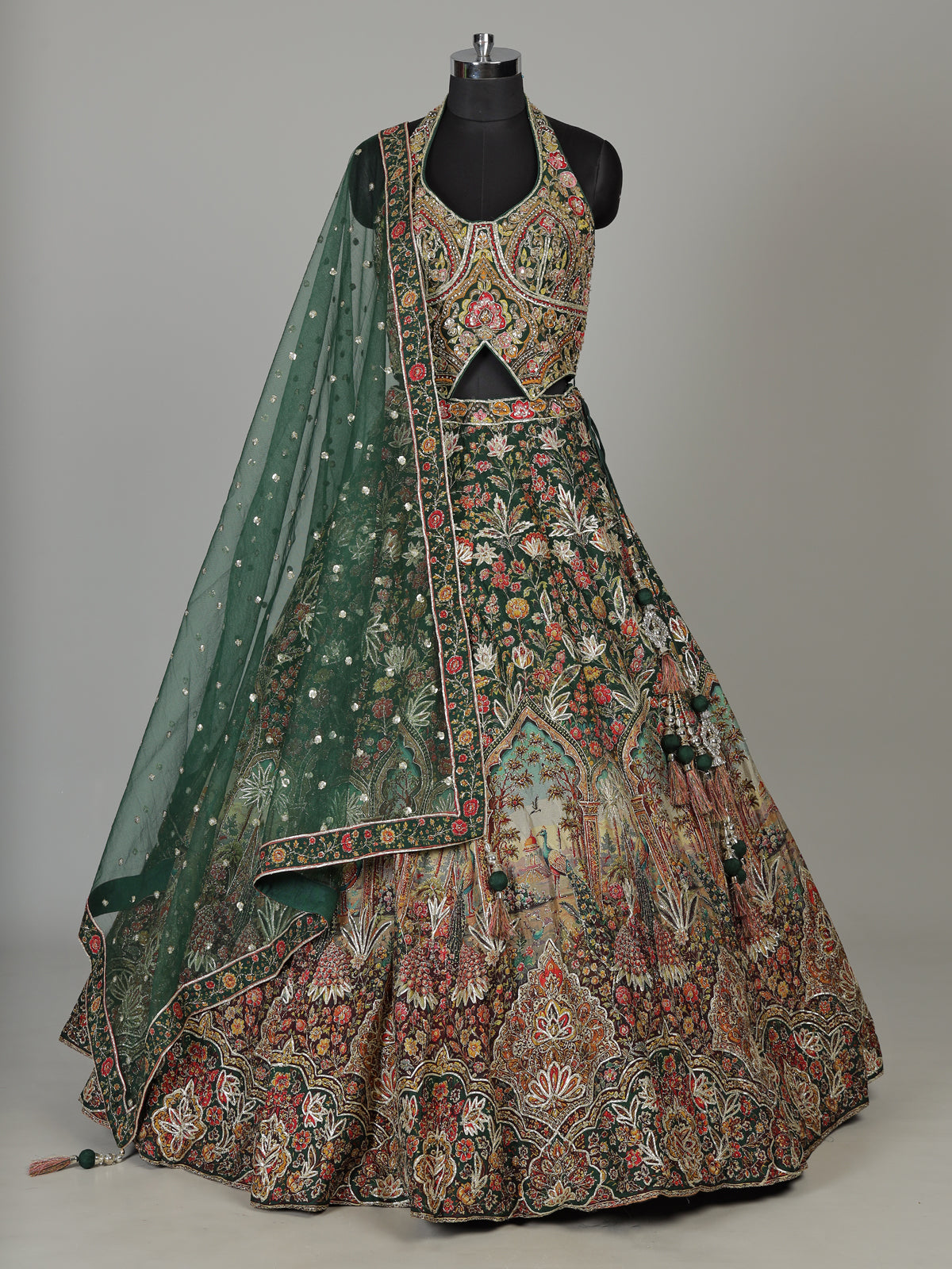 Green silk floral lehenga choli with halter neck embellishments