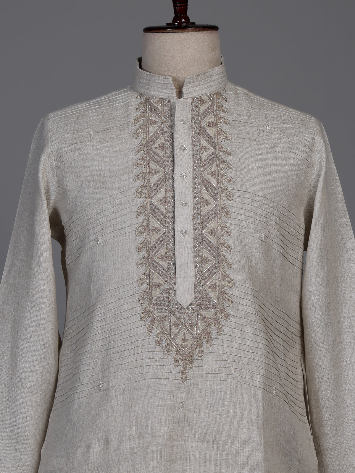Fawn beige linen kurta suit with geometric chevron embroidered detailing