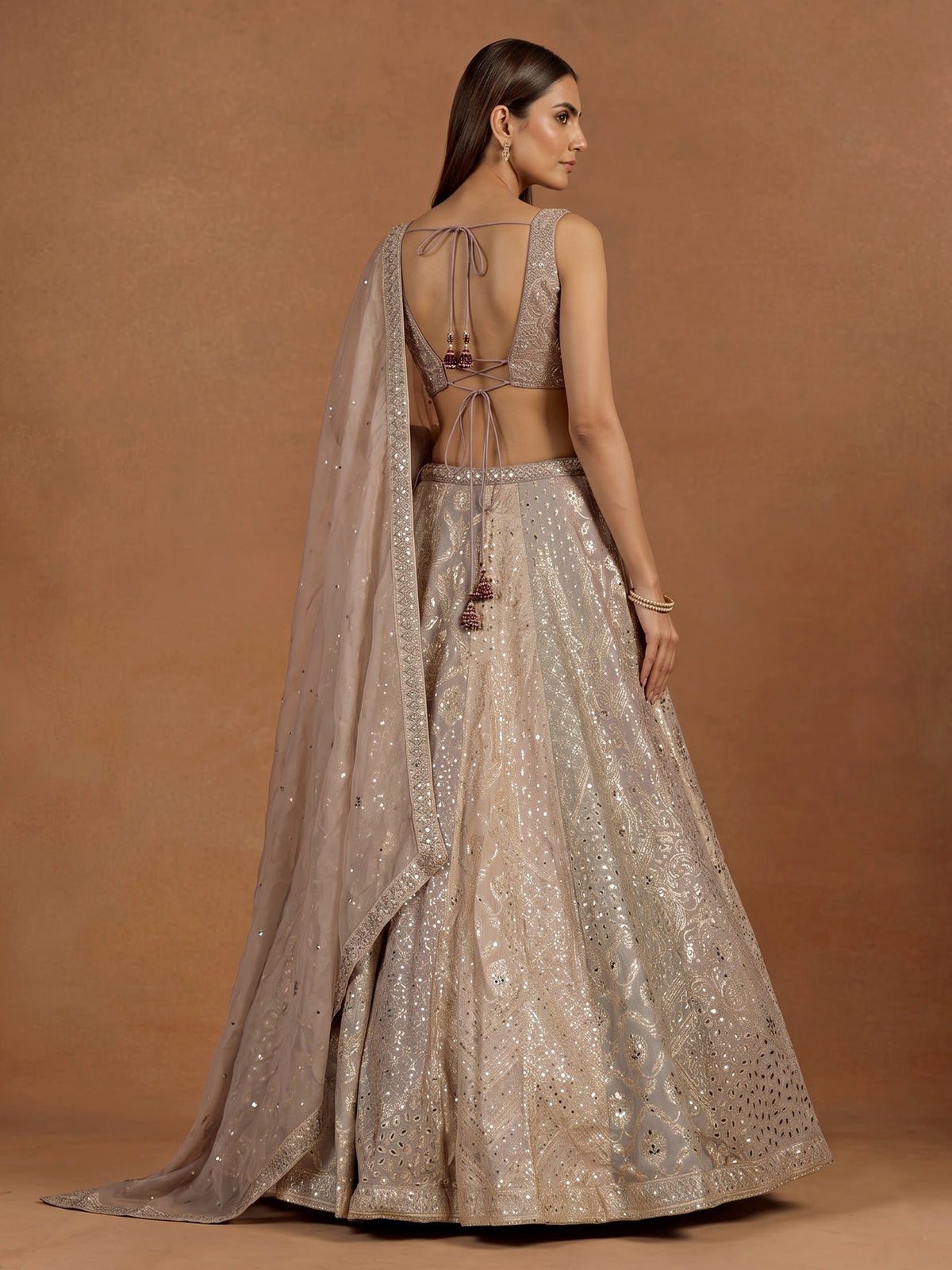 Grape purple silk lehenga choli with luxurious zardosi embellishments