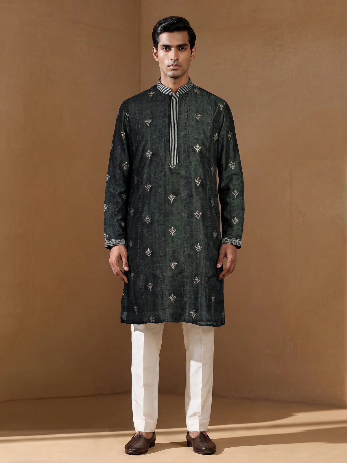 Forest green silk blend kurta set with antique silver detailing