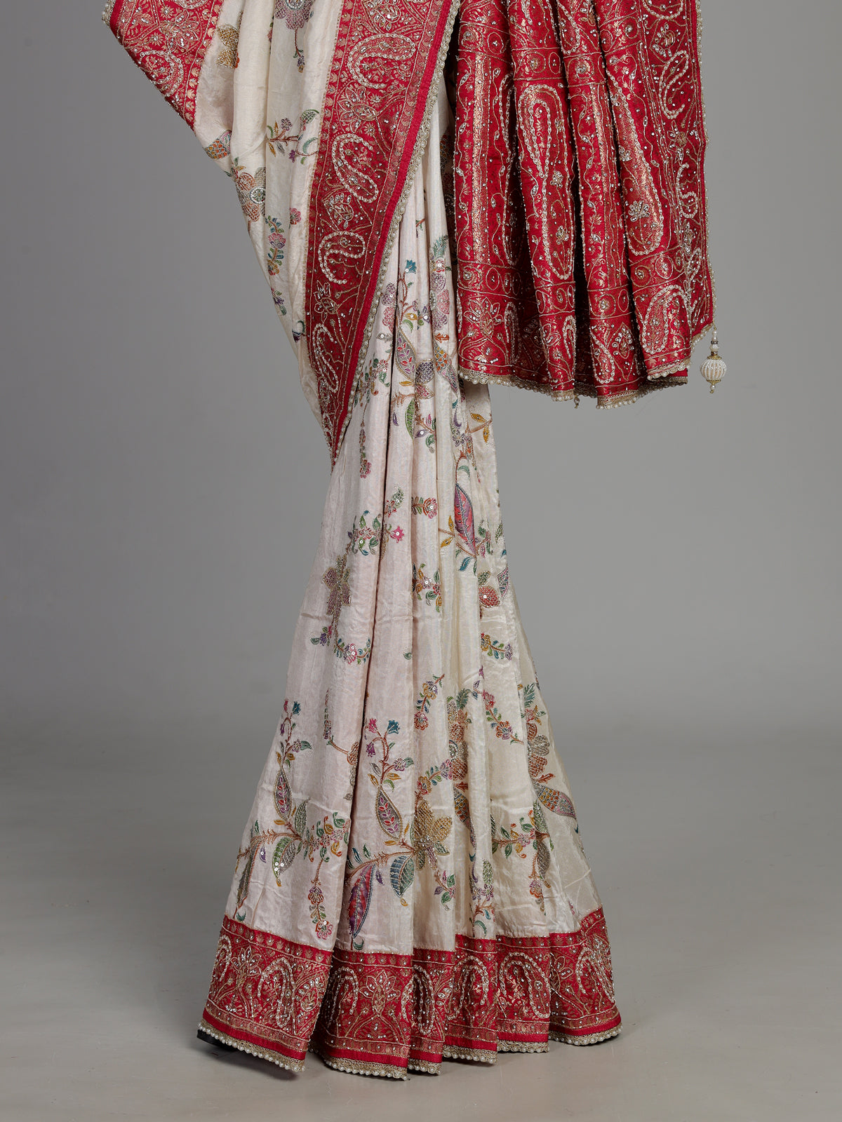 Cream pashmina saree with floral embroidery and diamond embellishments