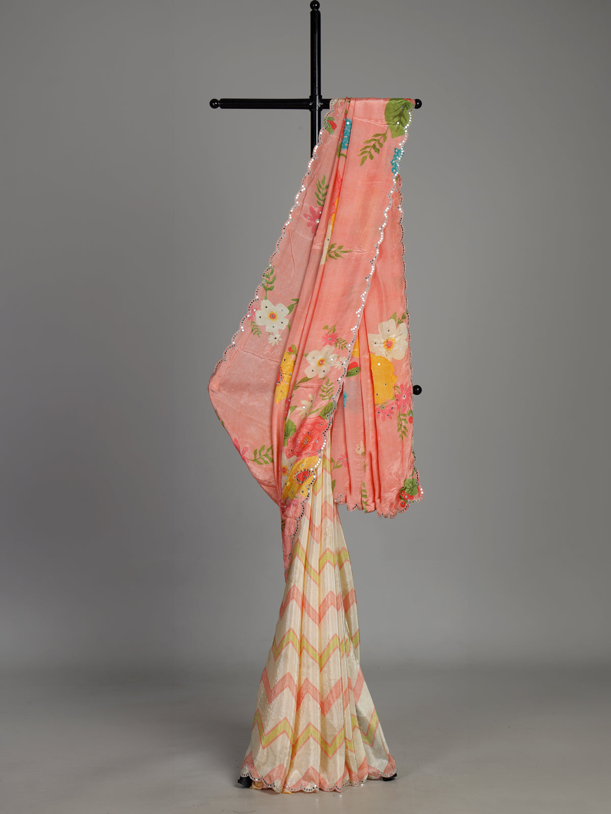 Peach crepe silk saree with floral prints and delicate aabla work