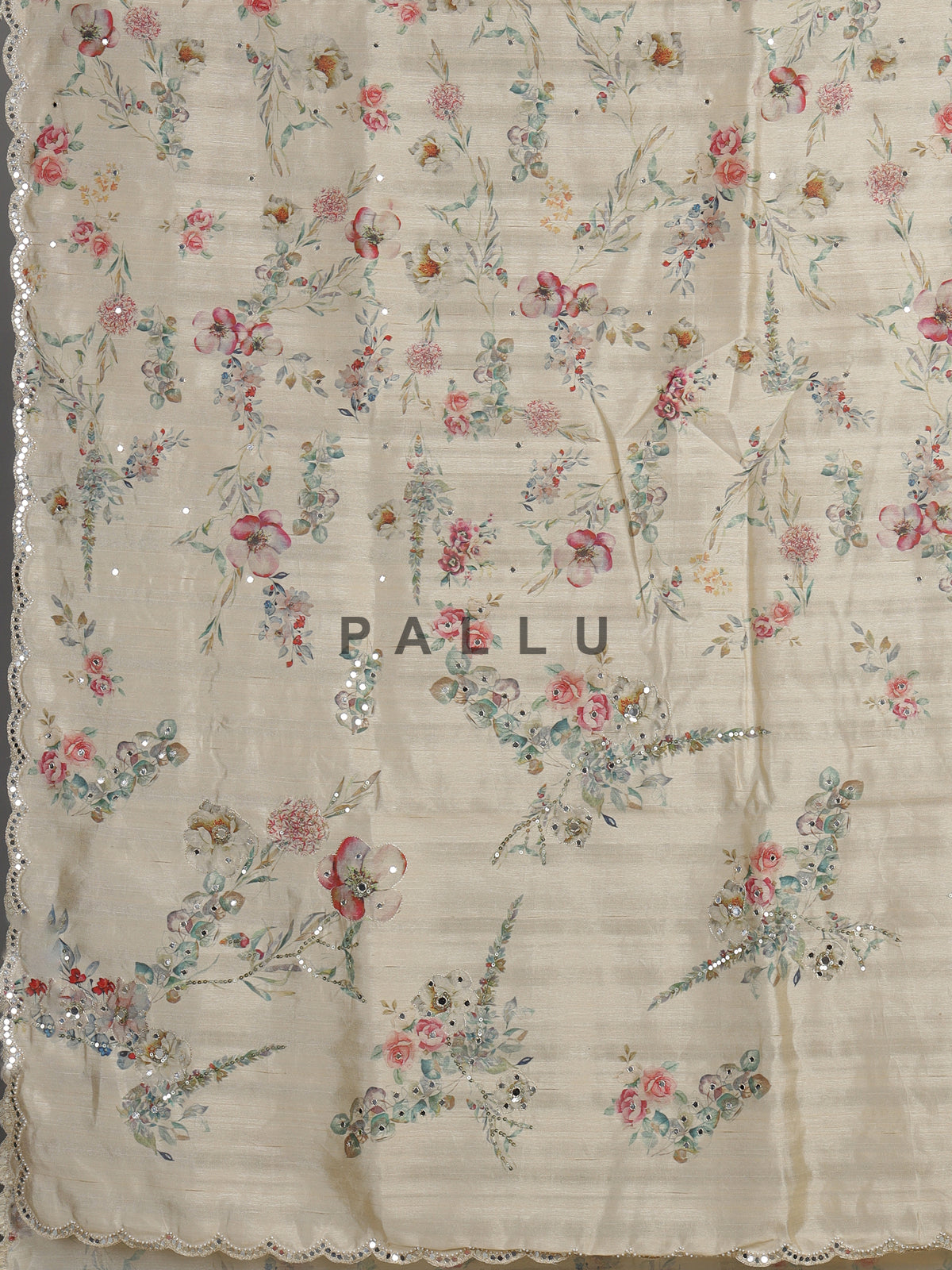 Cream tusser silk saree with floral prints and embellished beadwork