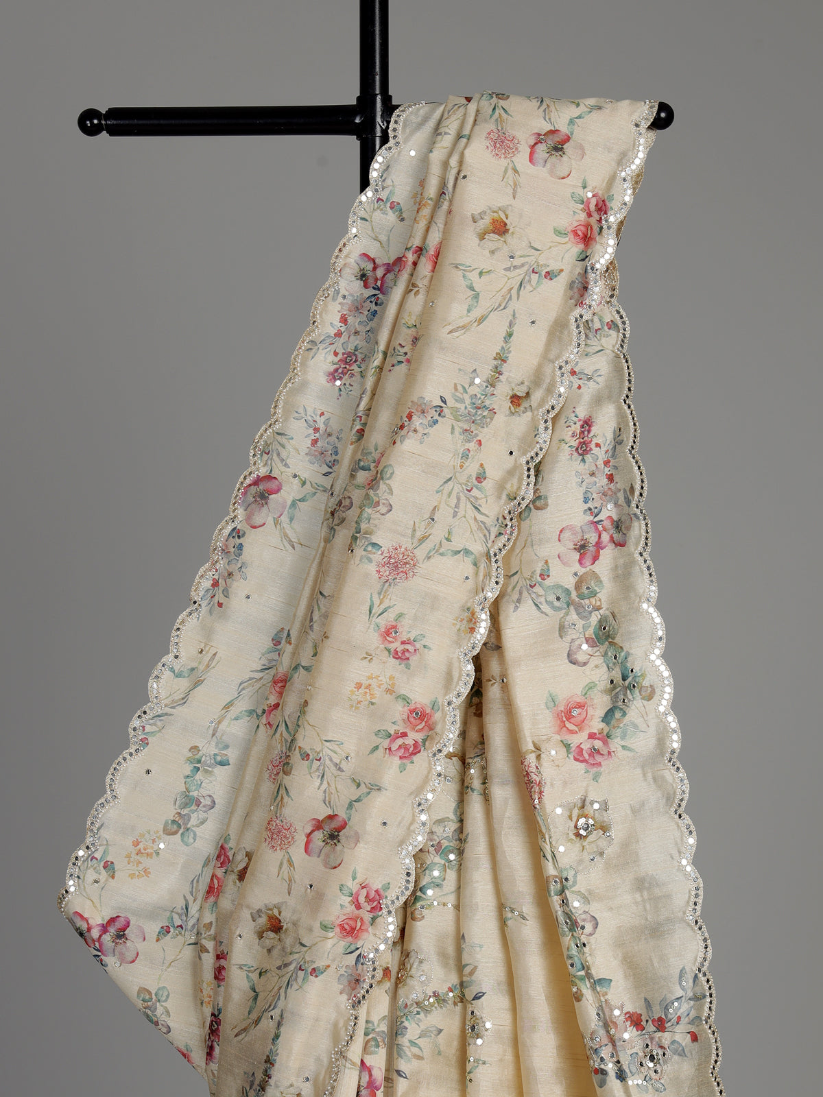 Cream tusser silk saree with floral prints and embellished beadwork