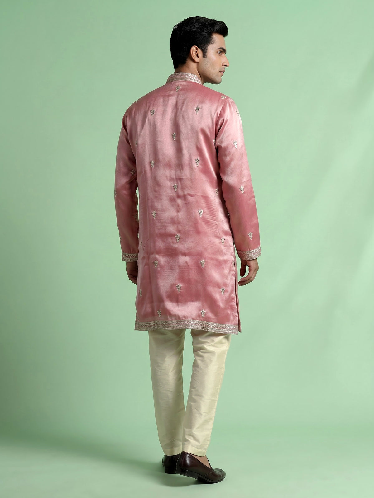 Pastel pink Dupion silk kurta suit with heavy zardozi embellishments for mens