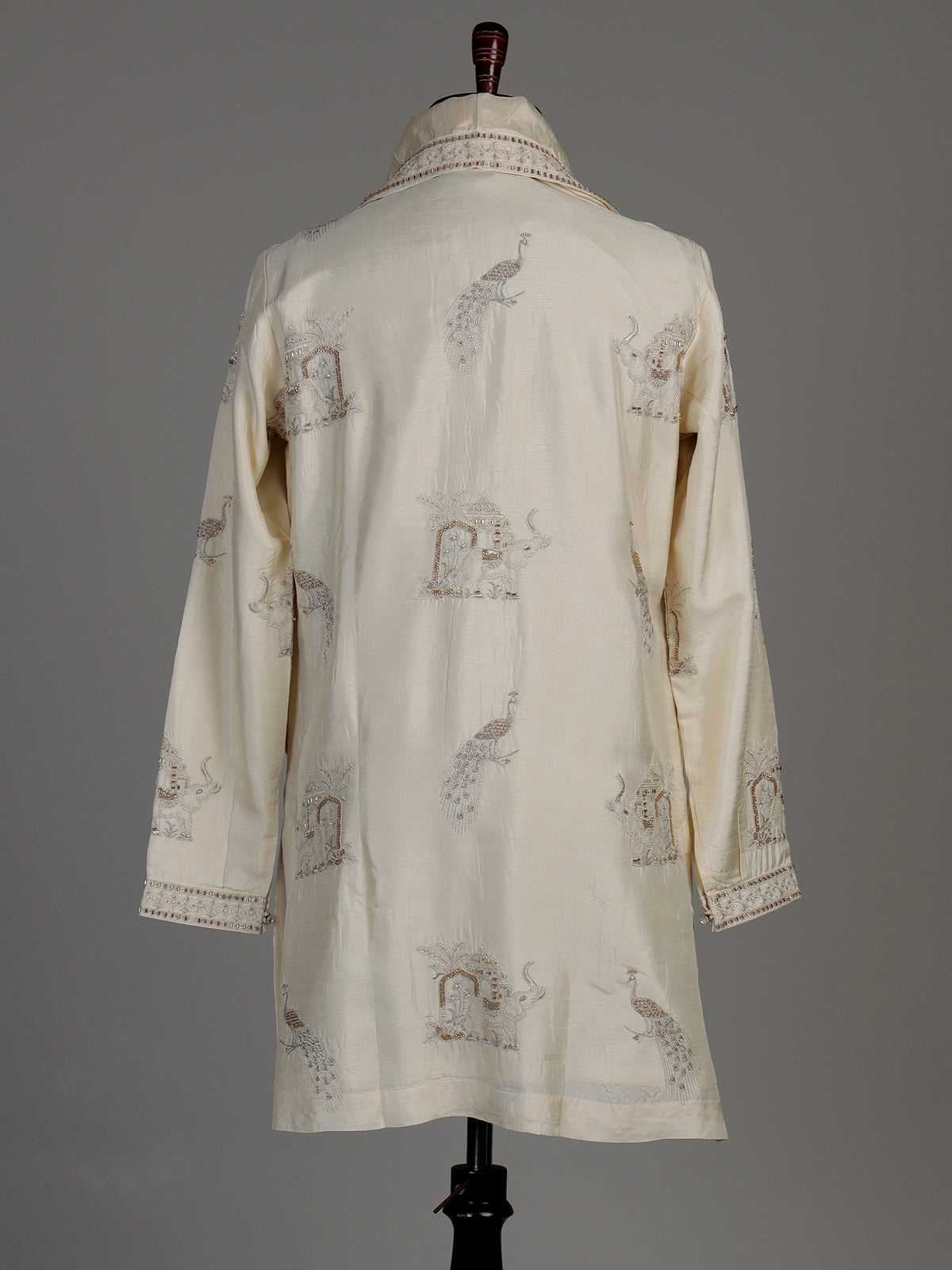 Cream raw silk kurta suit with royal peacock and elephant embroidery for mens