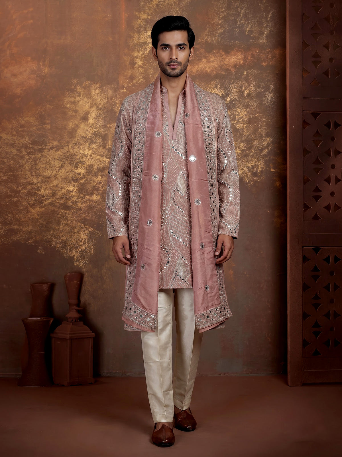Pastel pink silk kurta suit with traditional mirror-work embroidery for mens