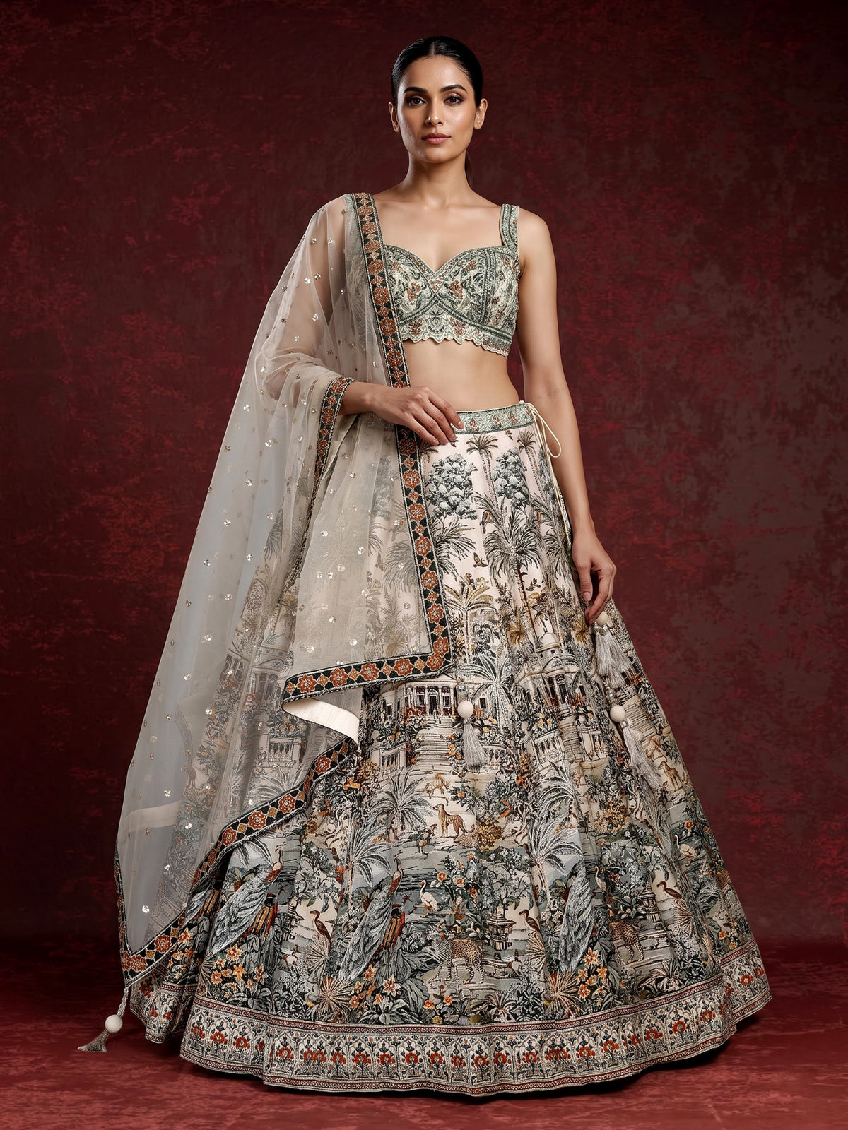 Cream silk printed lehenga choli with intricate zardosi and gota work