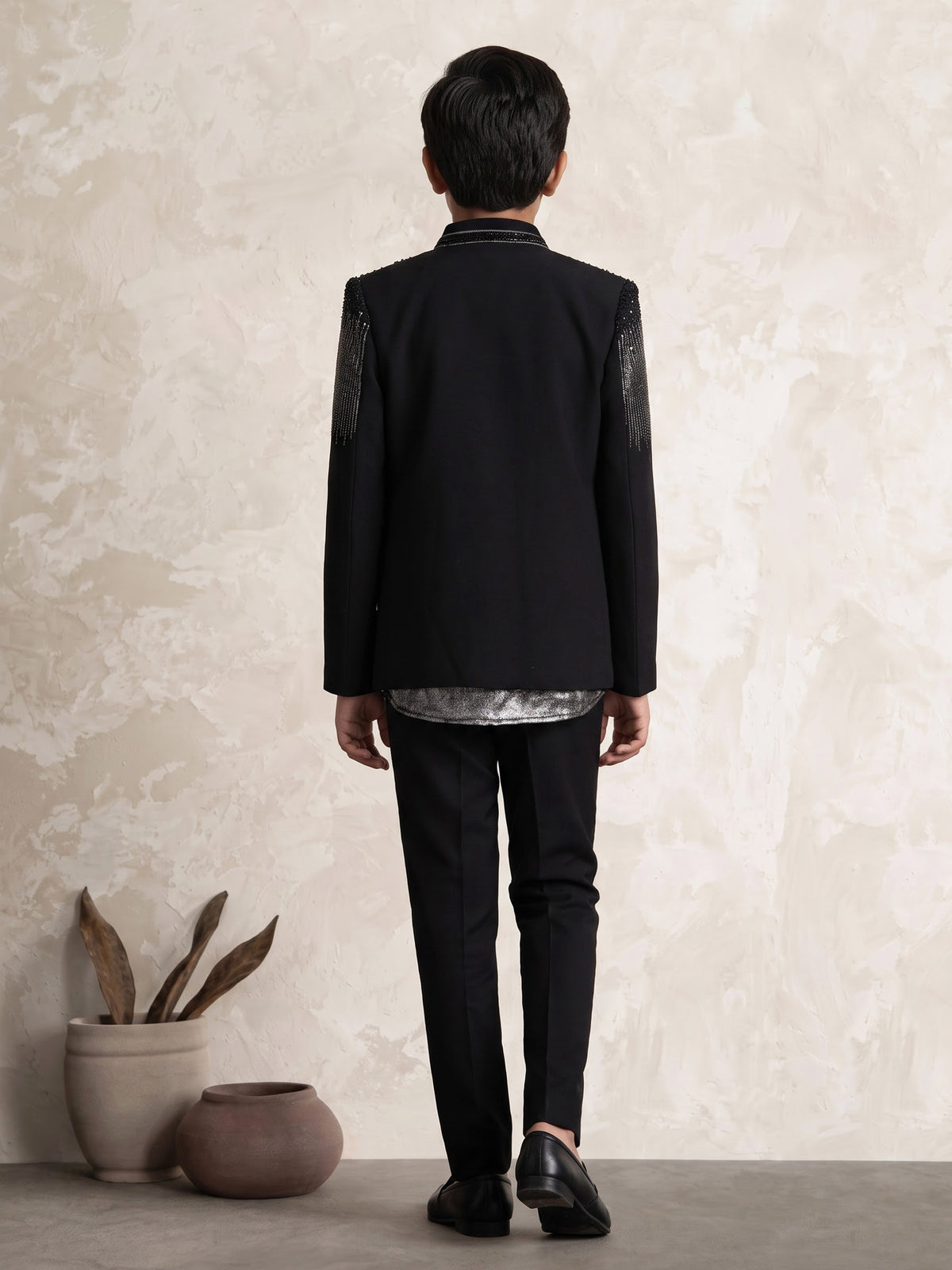 Black terry rayon boys Indo-Western suit with cascading cutdana embellishments