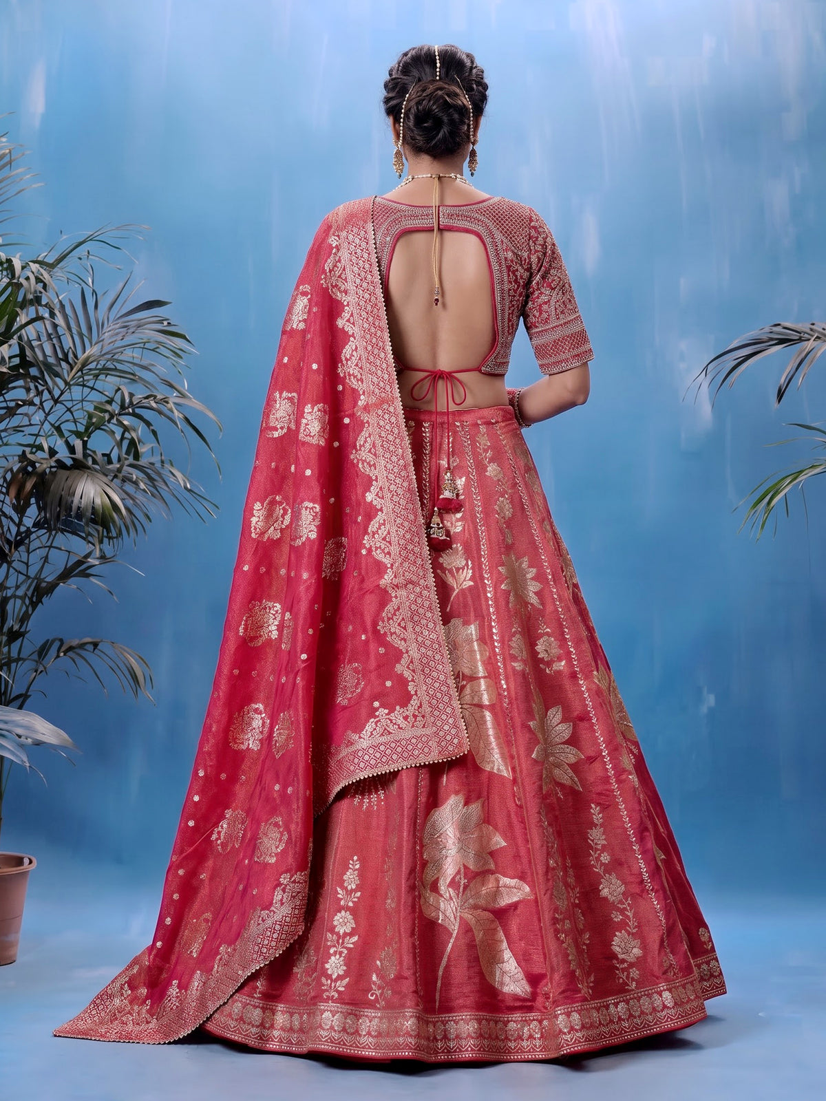 Rani pink silk lehenga choli with ornate floral embroidery