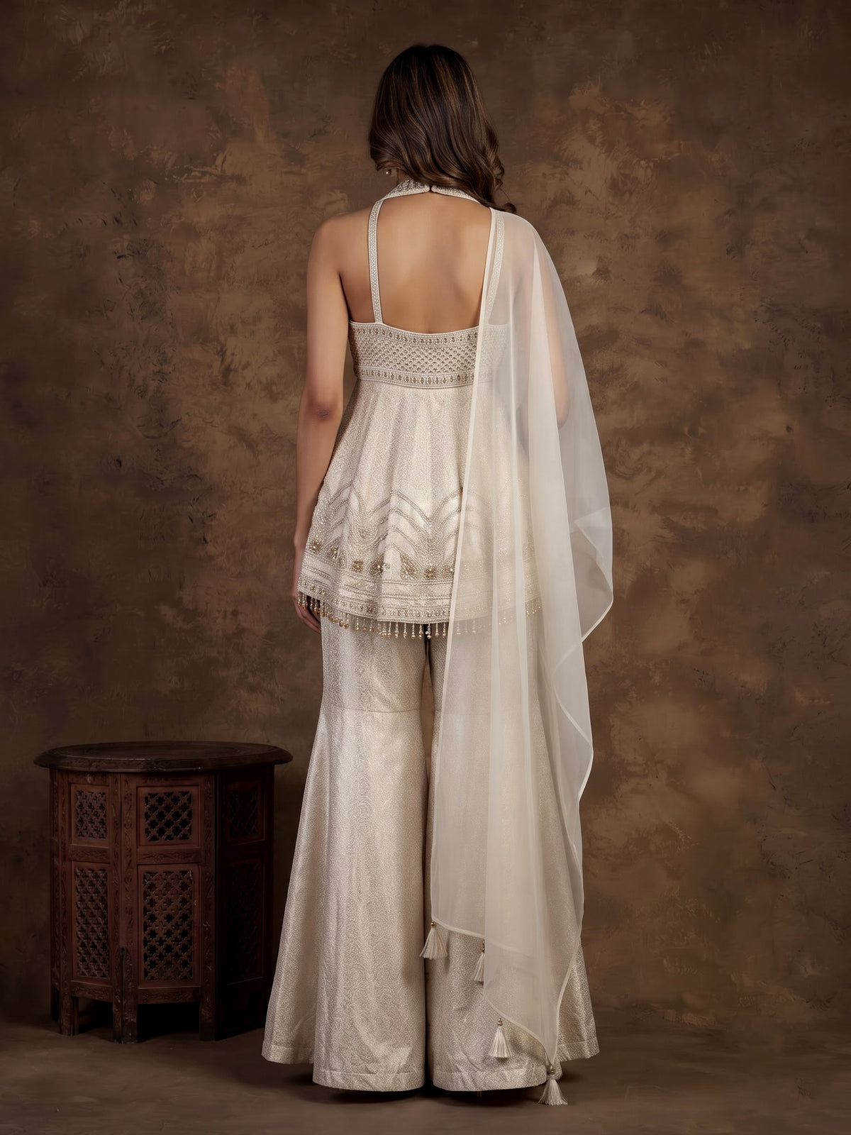 Cream brocade silk palazzo suit with rich cutdana detailing