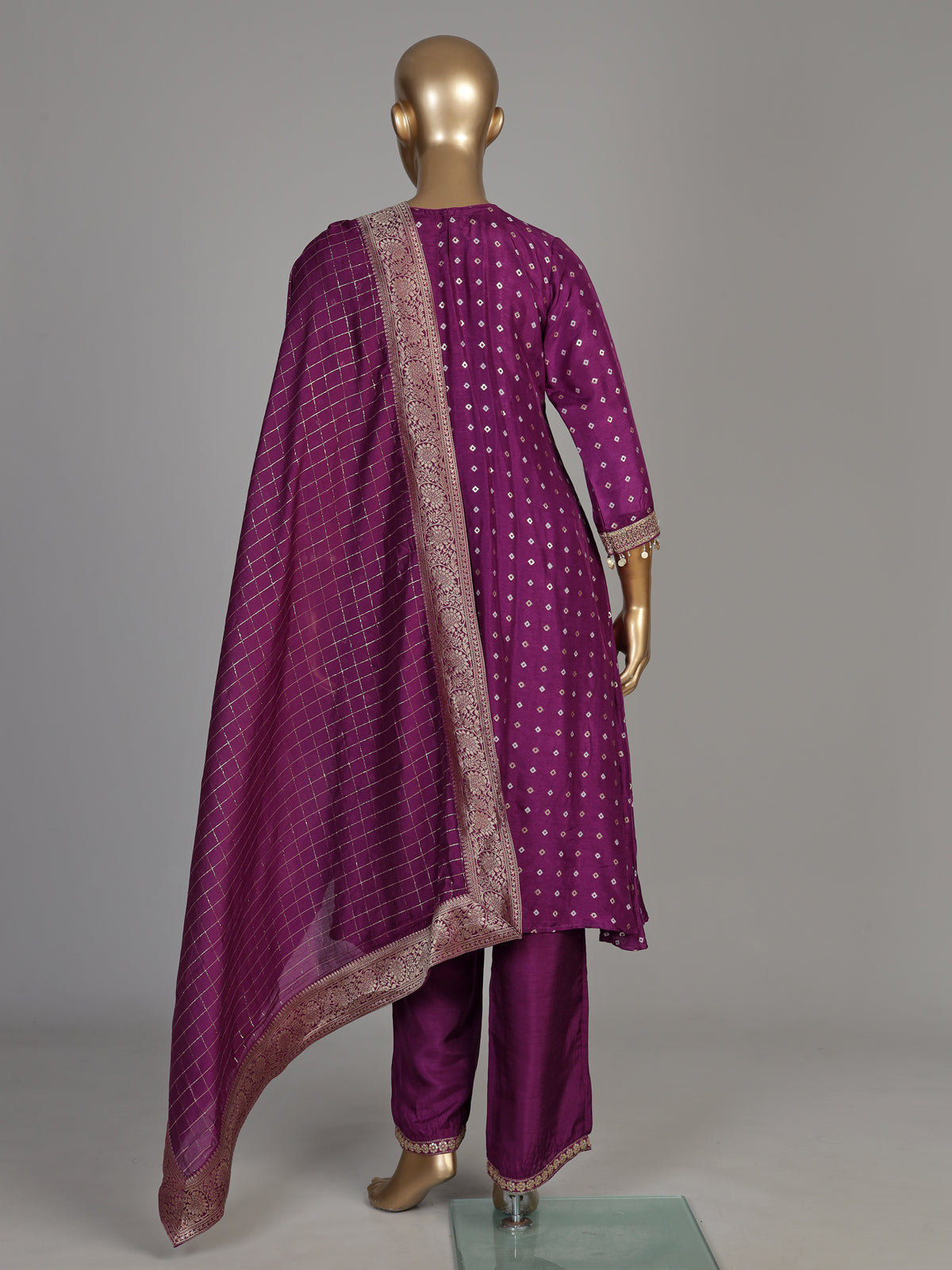 Violet purple silk bandhani suit with embroidered yoke and tassels