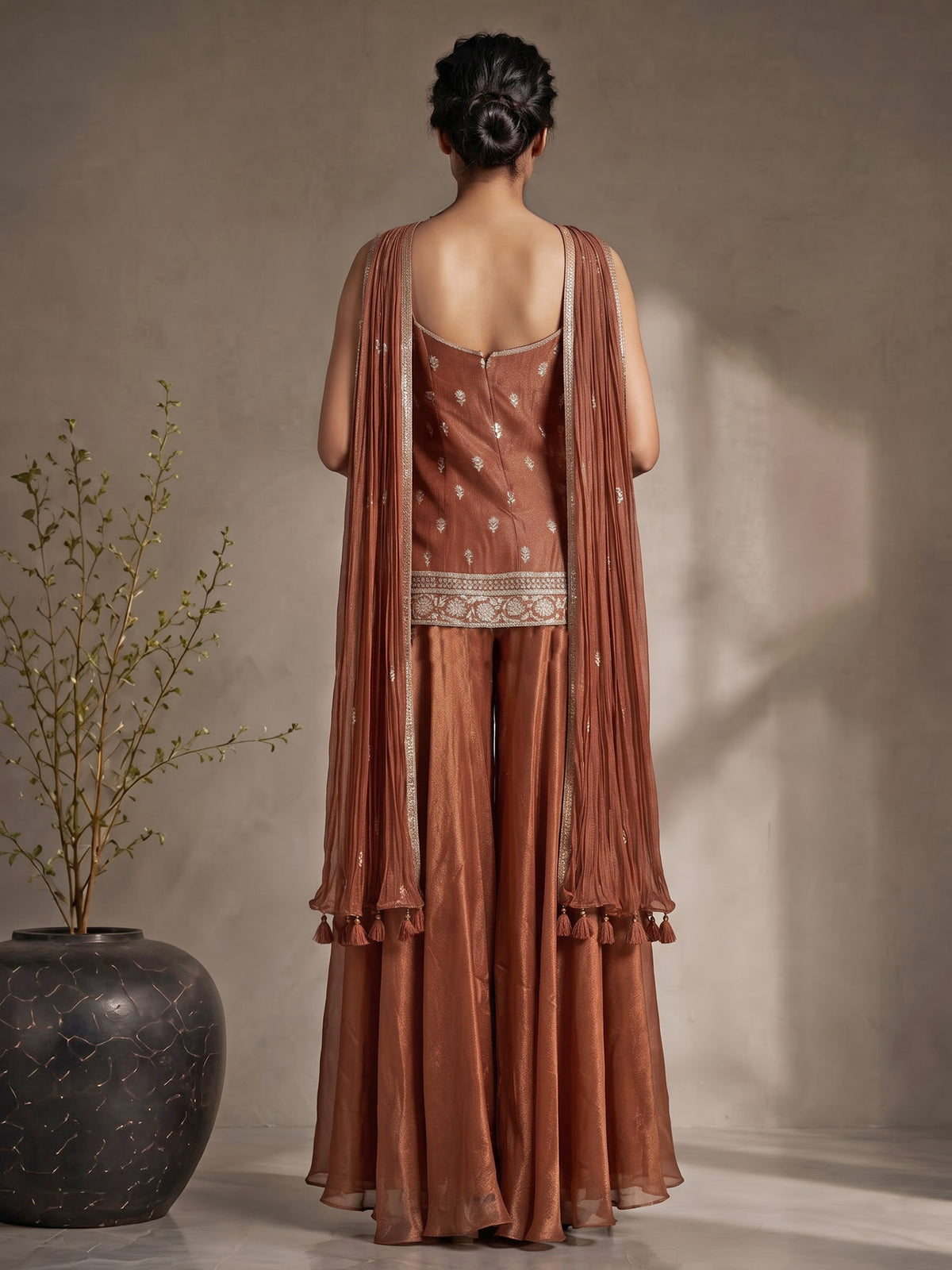 Rust peach tissue silk palazzo suit with intricate zardosi work