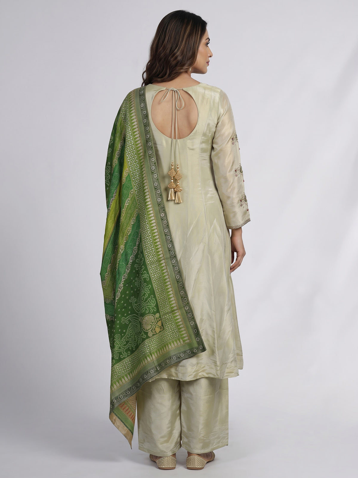 Pastel pista green tissue silk anarkali suit with diamond accents