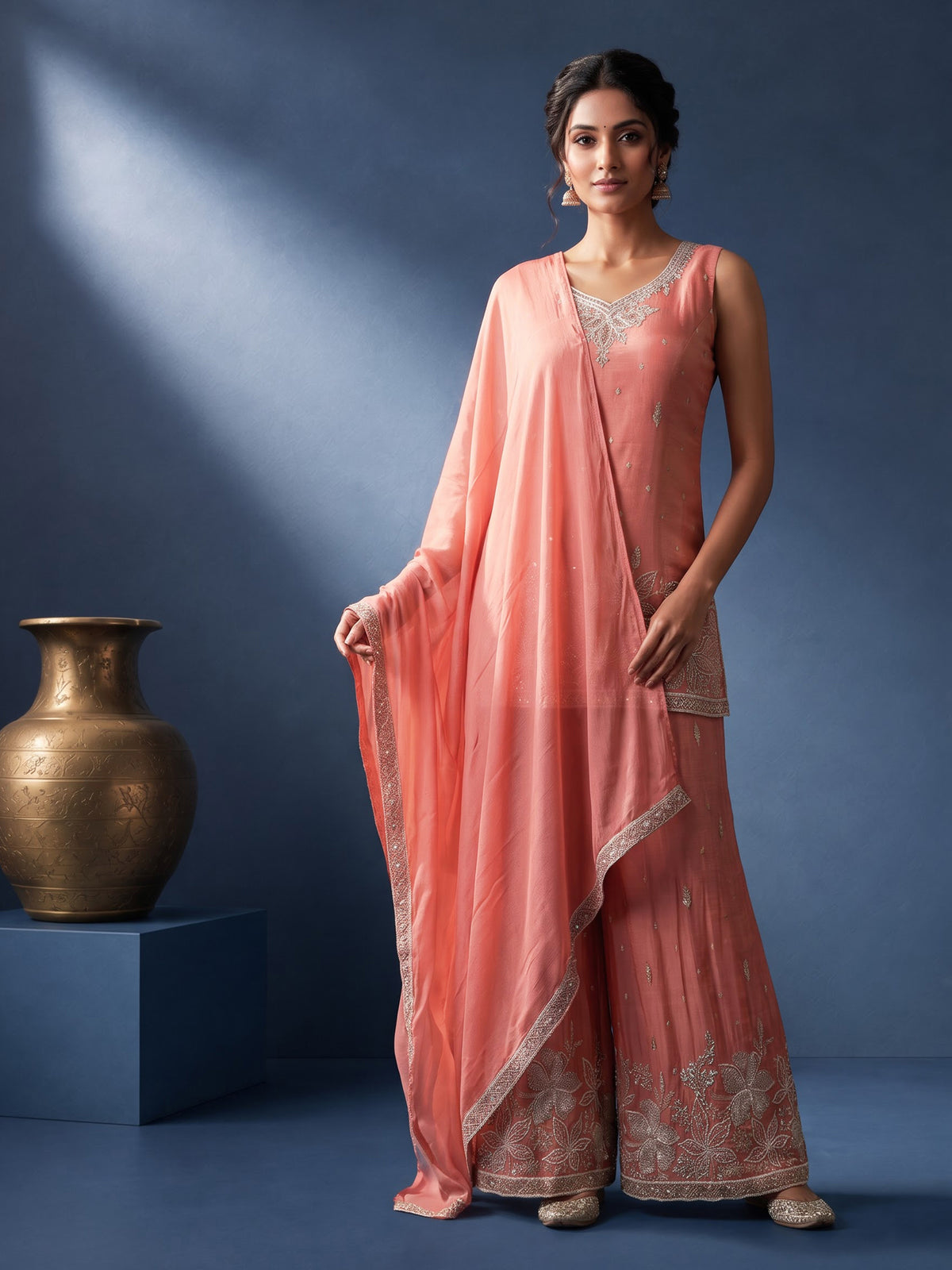 Pastel peach silk palazzo suit with pearl and zari detailing