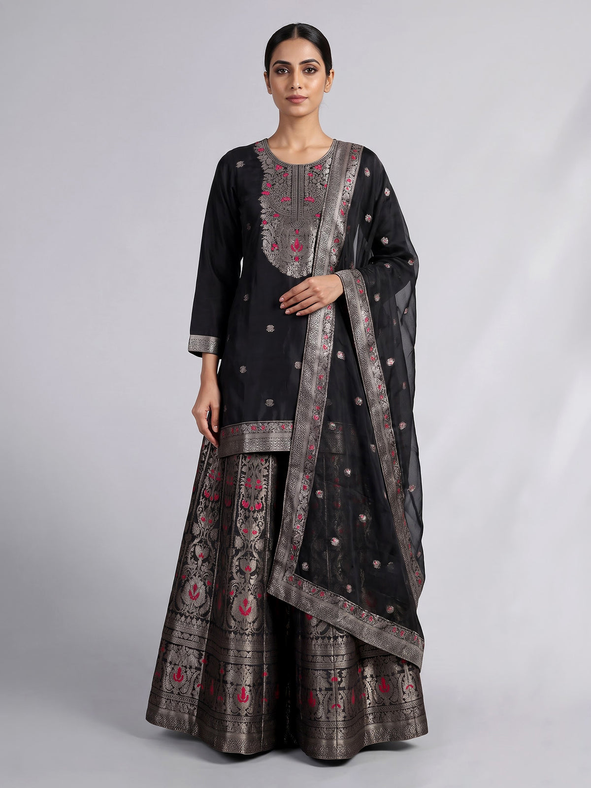 Black banarasi silk palazzo suit with an ornate zari yoke