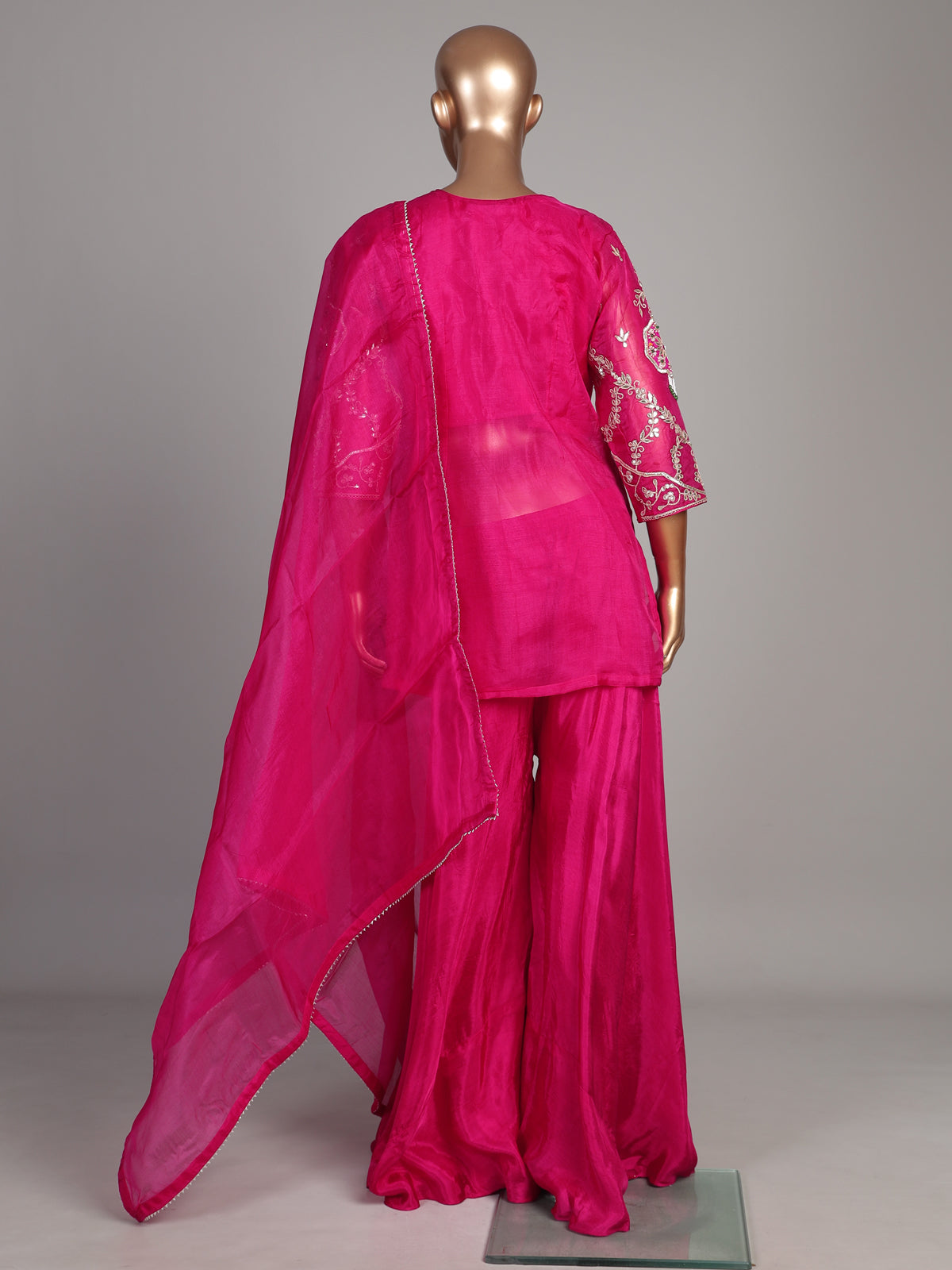 Rani pink chanderi silk palazzo suit with gota detailing