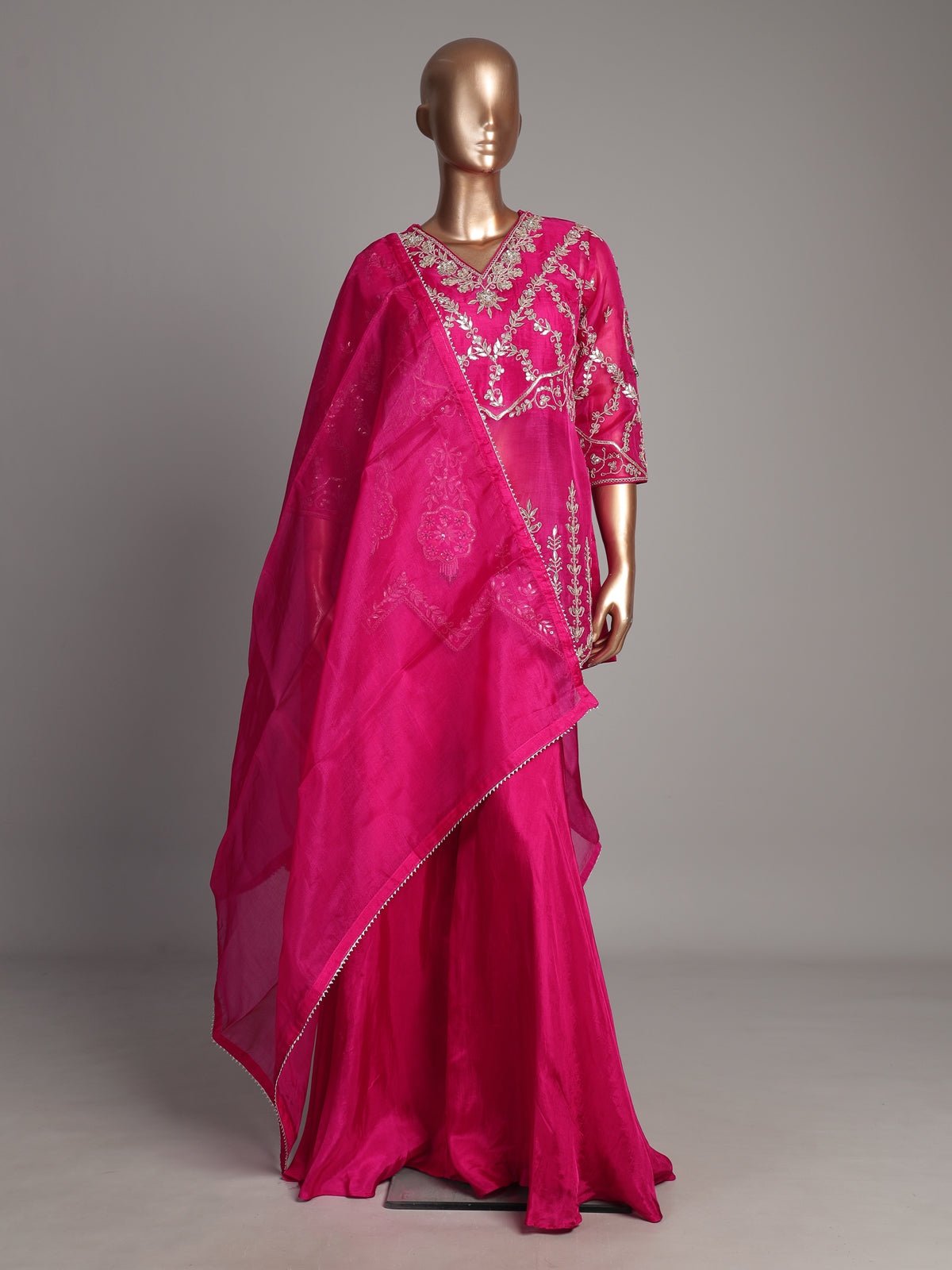 Rani pink chanderi silk palazzo suit with gota detailing