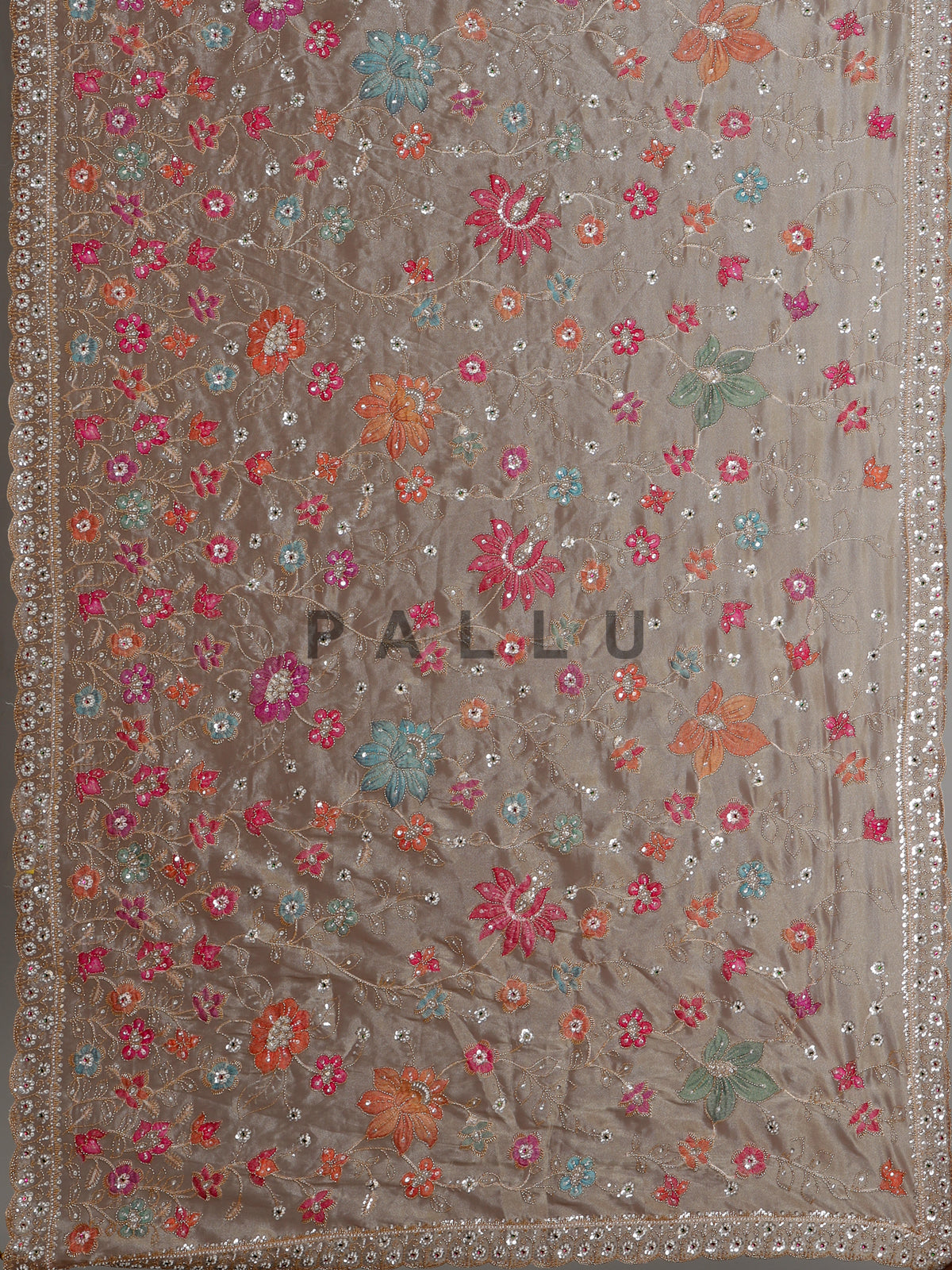 Coffee brown tissue silk saree with floral embroidery and tassels