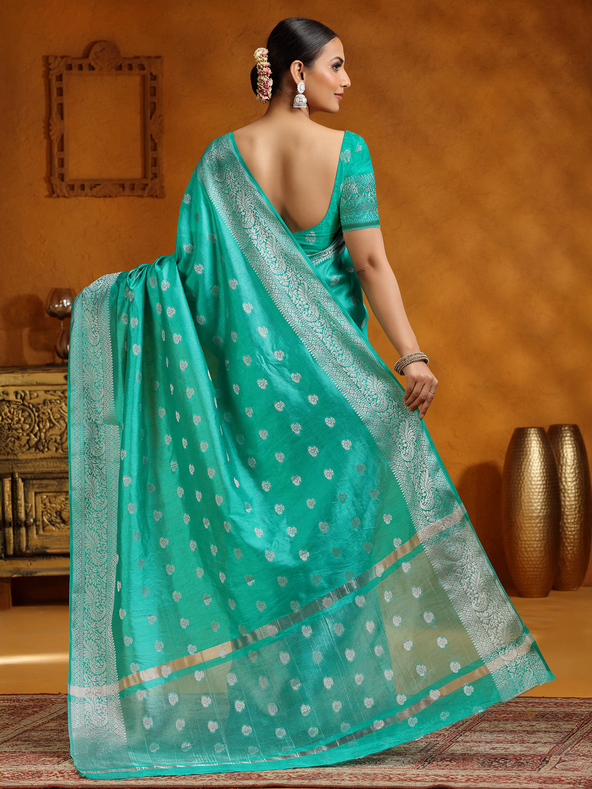 Aqua silk saree with silver weaving