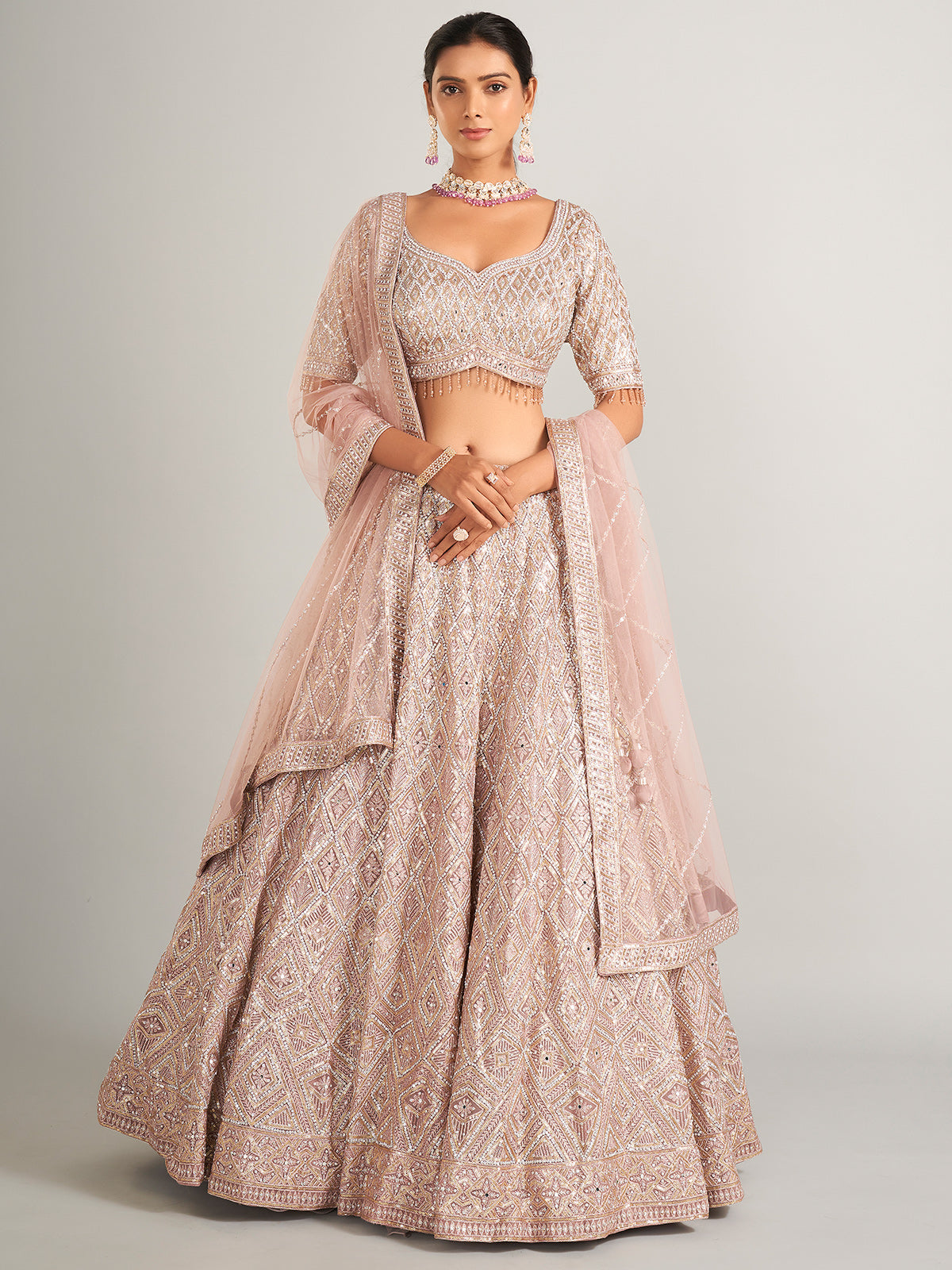 Beautiful onion hue lehenag choli in net
