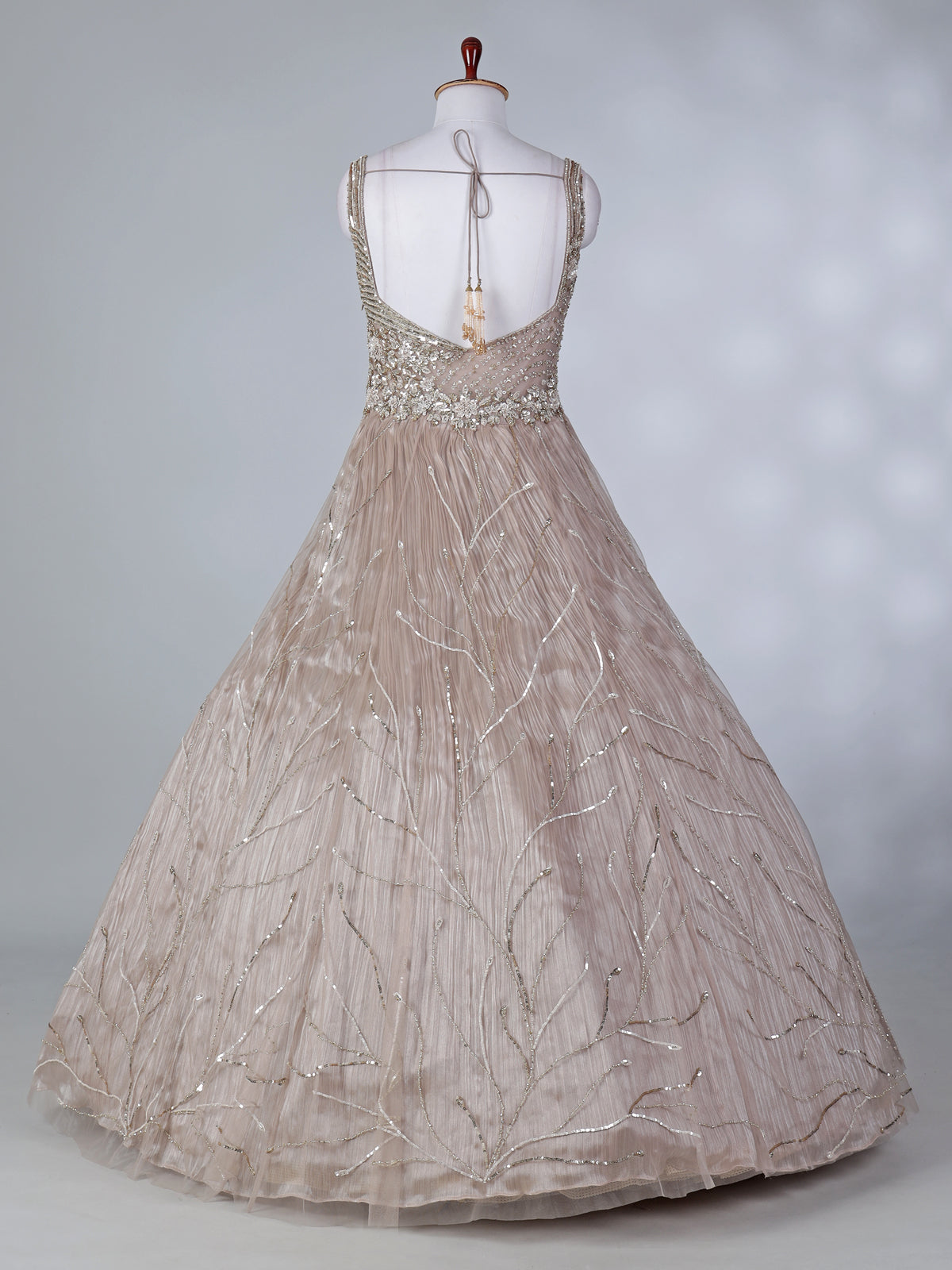 Beige net sleeveless sweetheart designer floor length gown