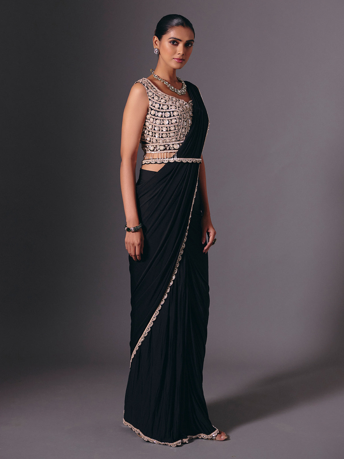 Black lycra saree with sequins and cutdana embellishments