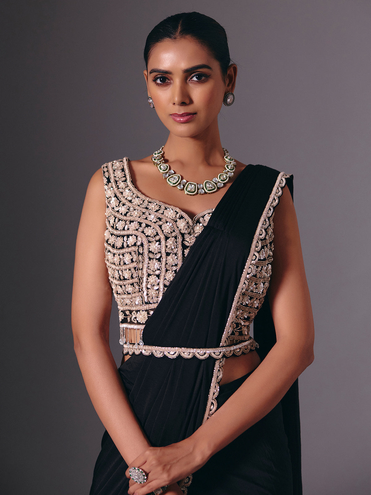 Black lycra saree with sequins and cutdana embellishments