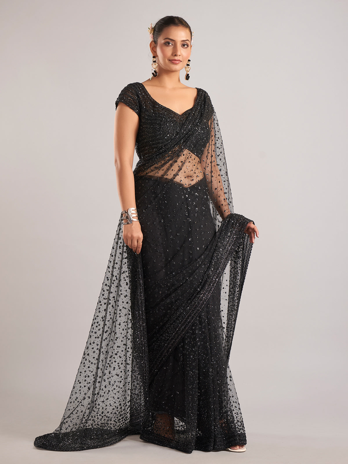 Black net saree with cutdana embellishments for women