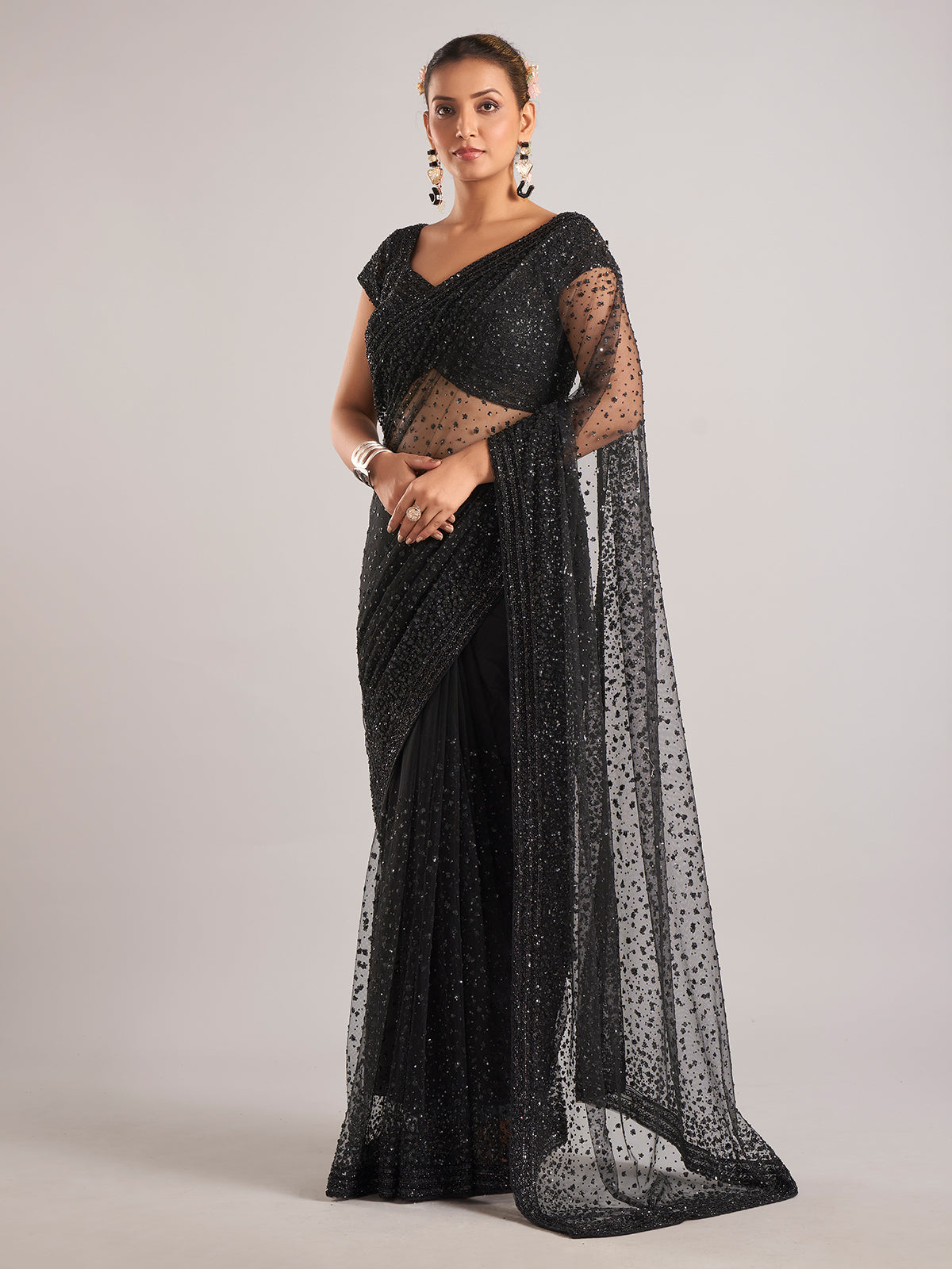 Black net saree with cutdana embellishments for women