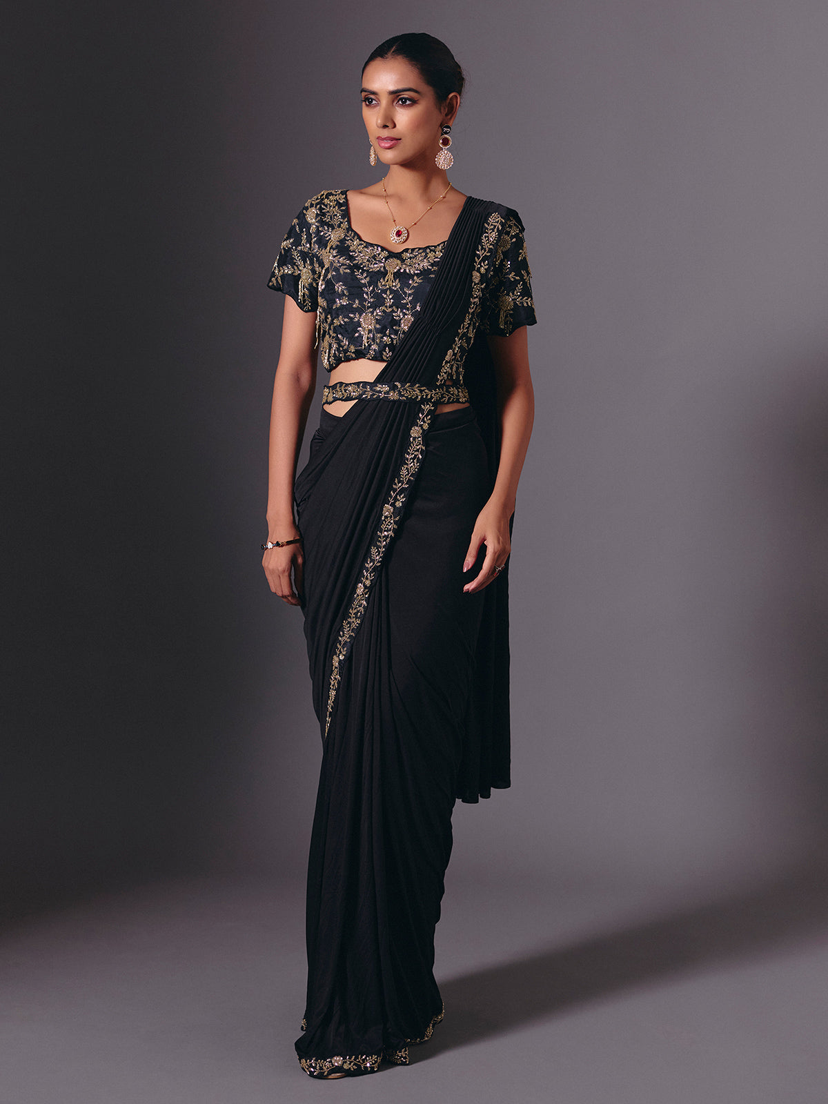 Black satin lycra saree with elegant festive embellishments