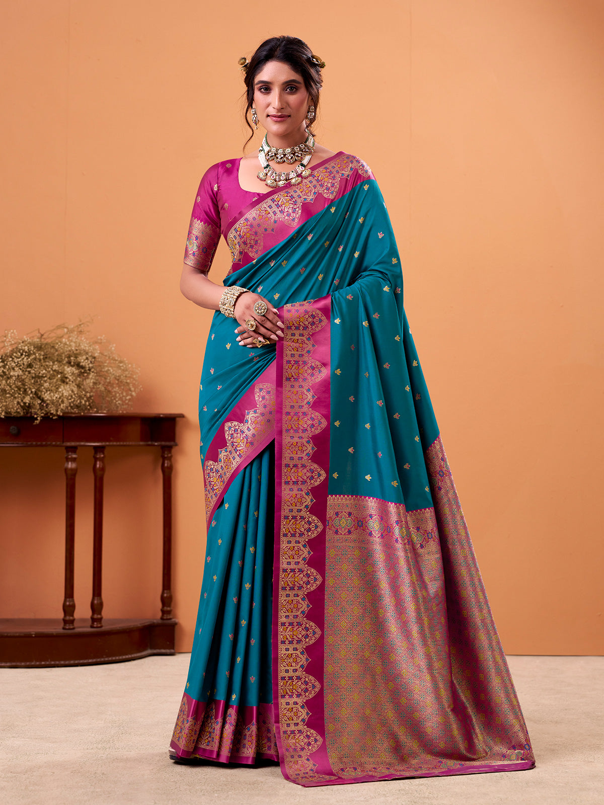 Blue satin silk saree with zari motifs