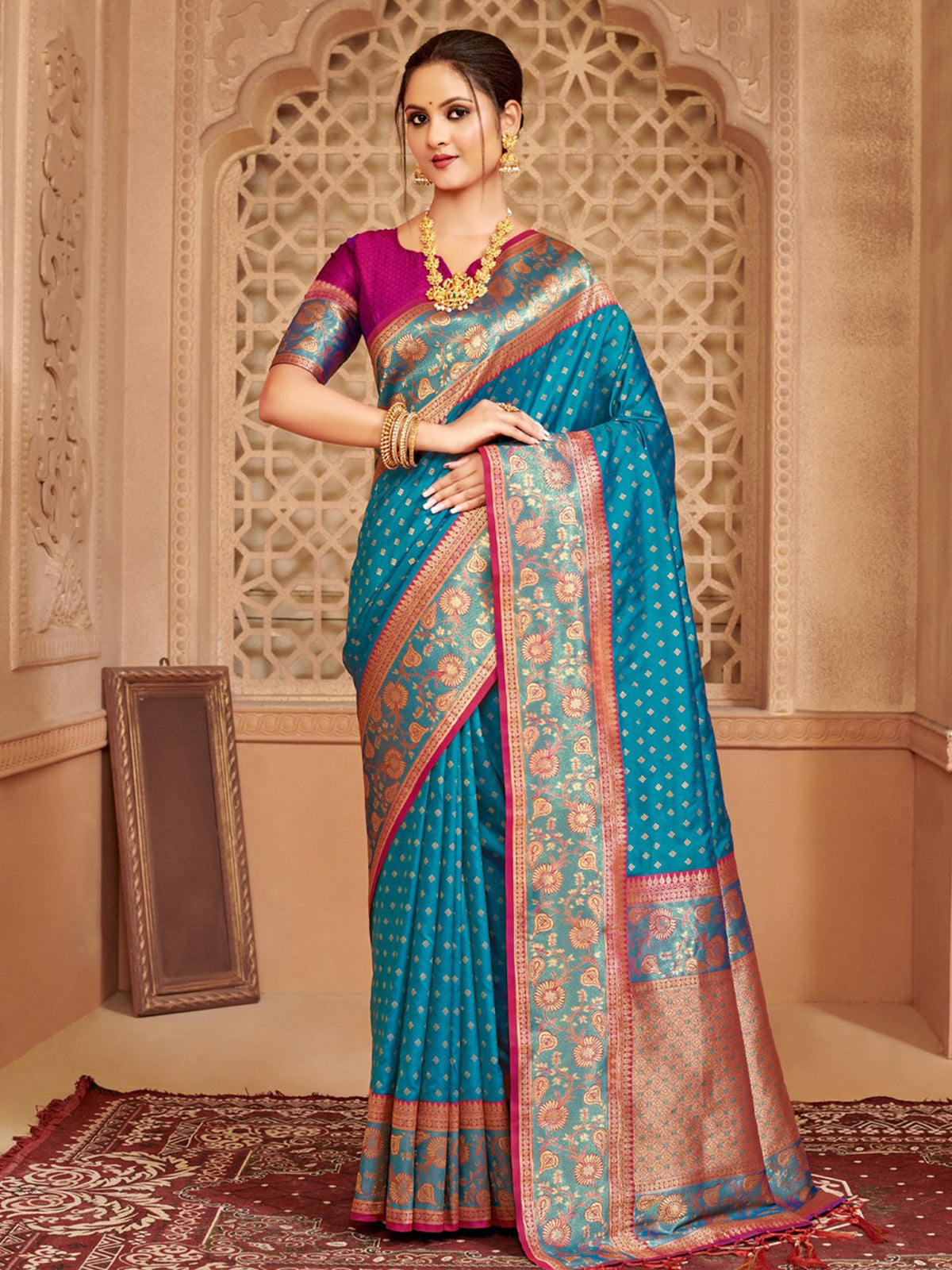 Blue silk saree with pink blouse