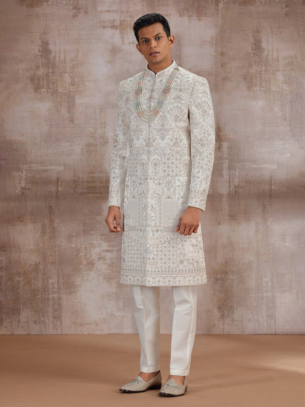 Cream art silk wedding sherwani for groom