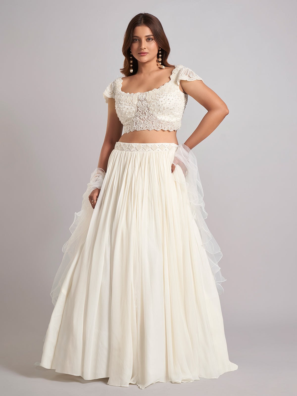 Cream georgette lehenga choli with pearl work