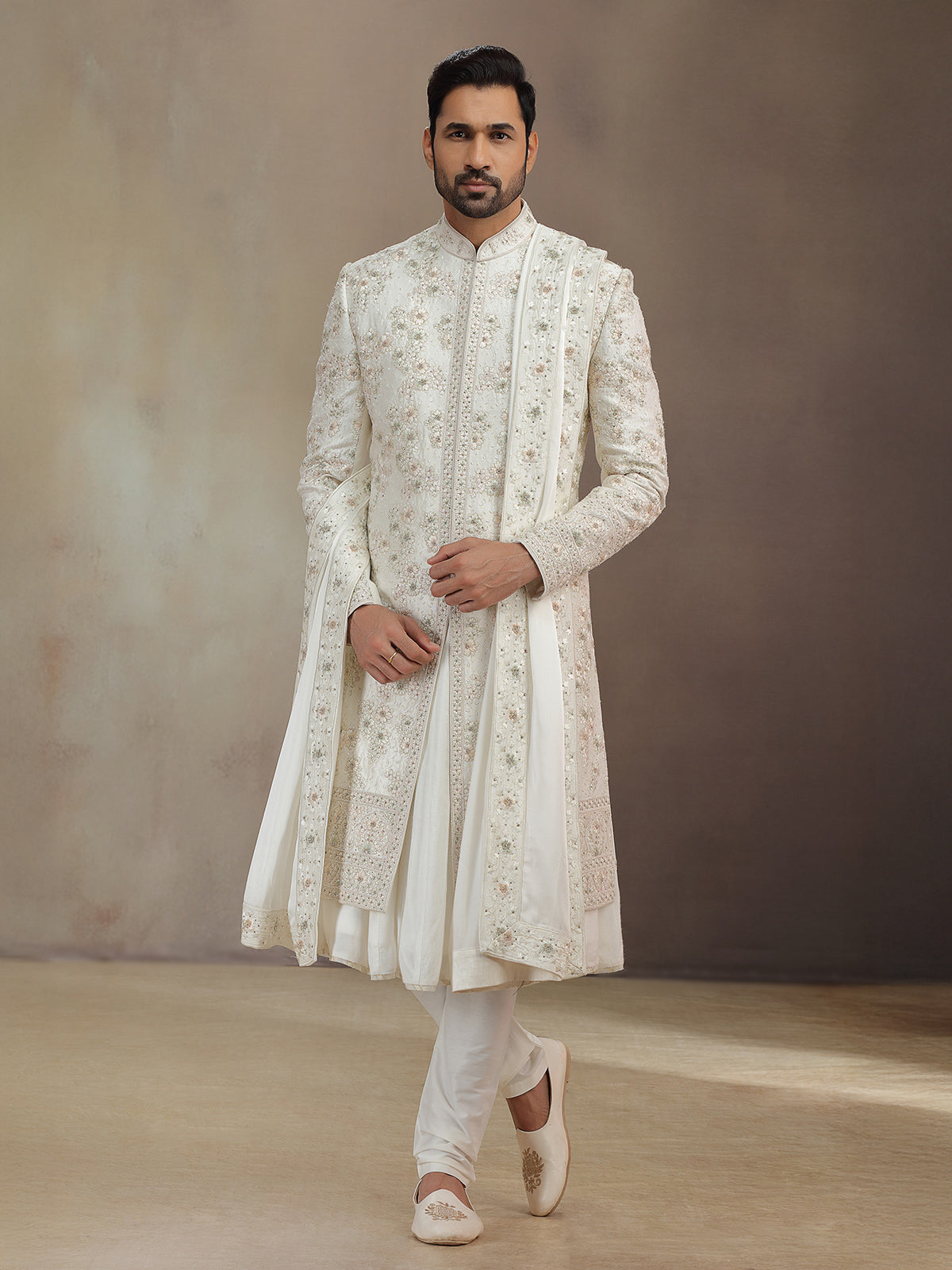 Cream silk peshwa style sherwani with dupatta for groom