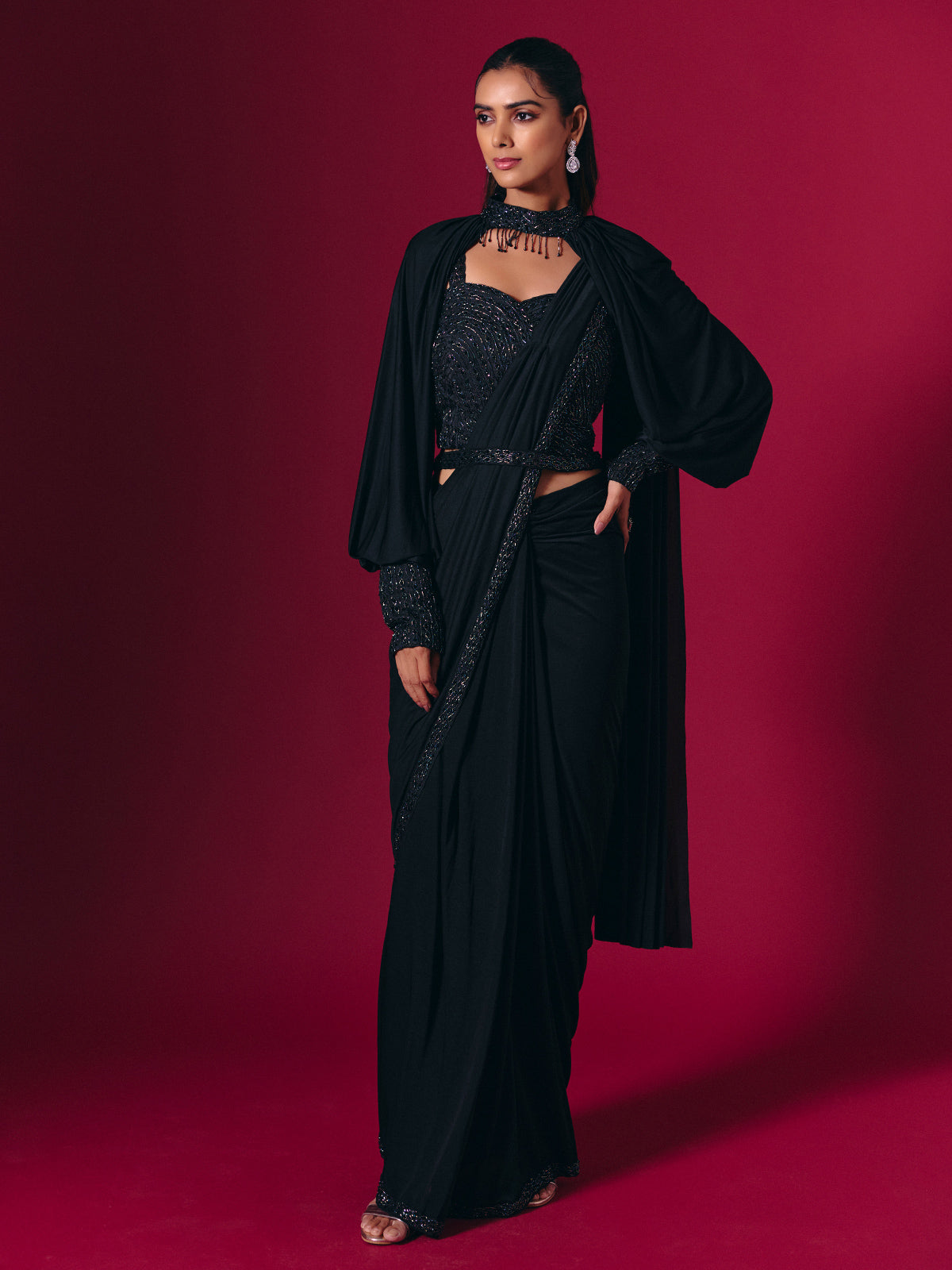 Elegant black lycra saree with cutdana pearl work
