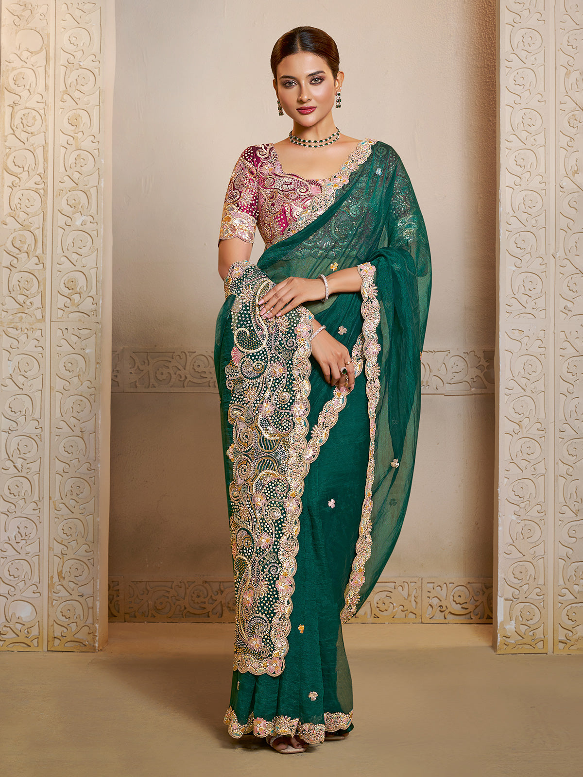 Emerald green organza satin saree of refined splendor