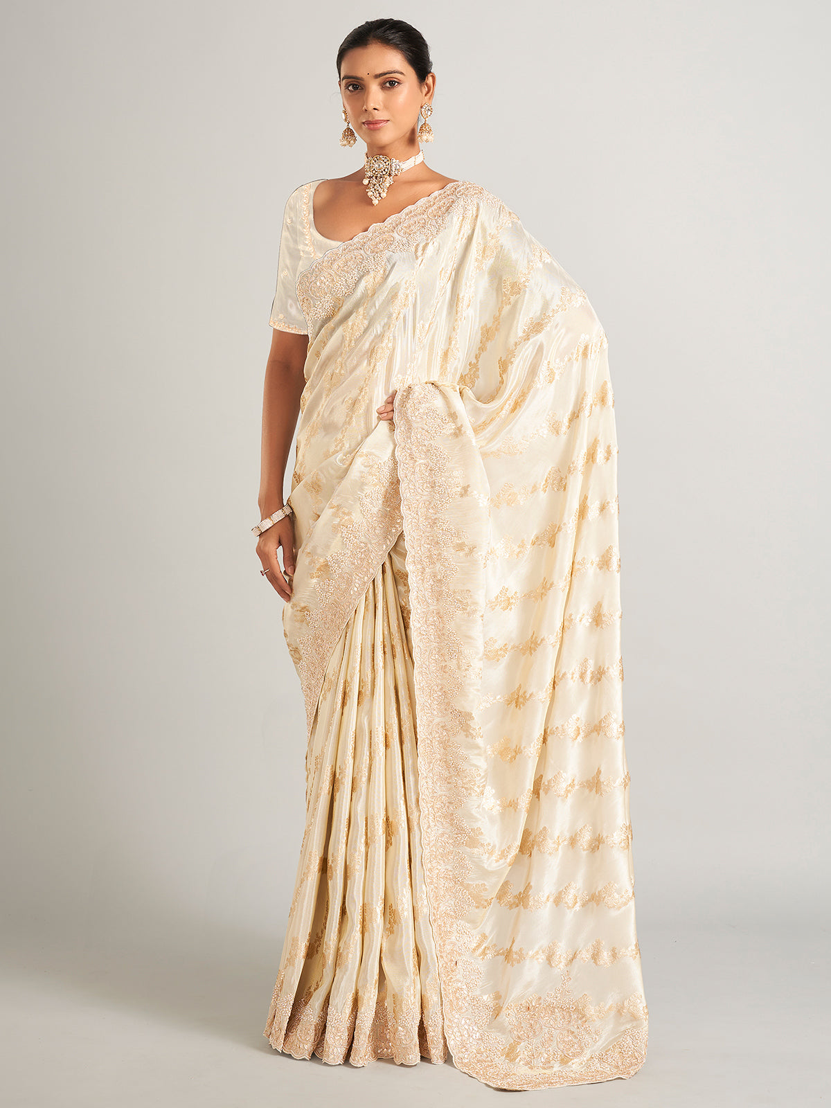 Fascinating silk saree in cream colour
