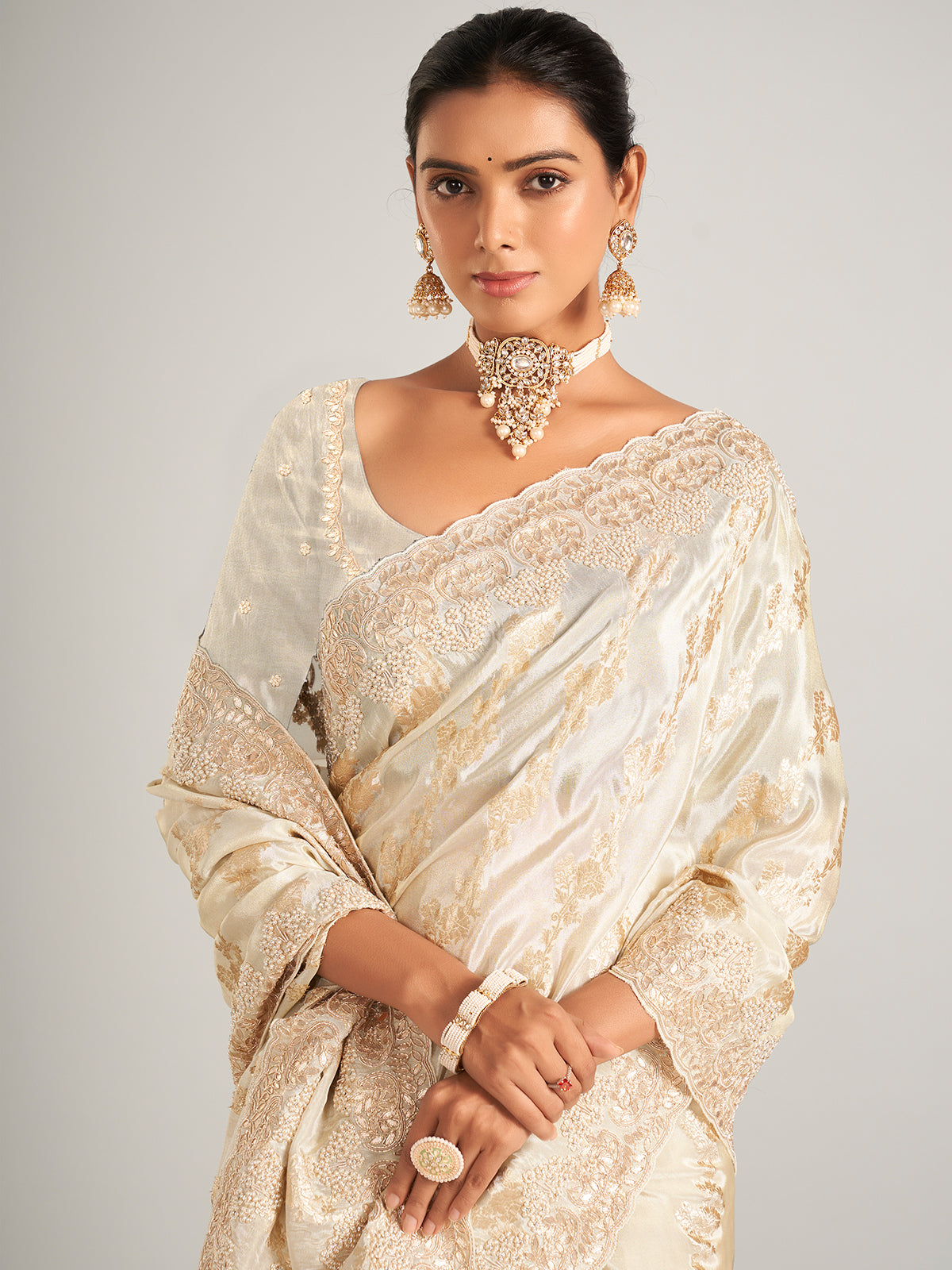 Fascinating silk saree in cream colour