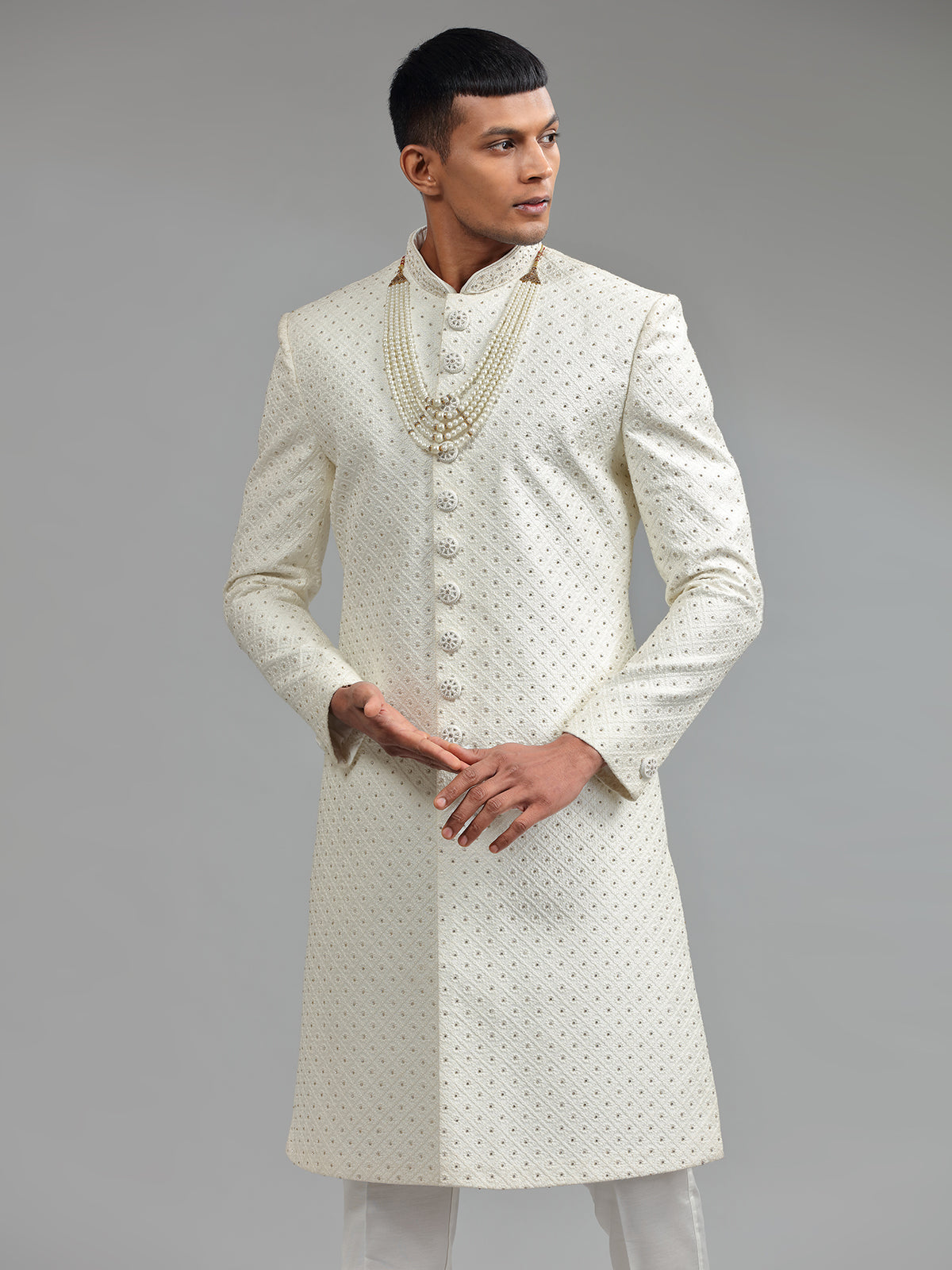 Glamorous silk white groom sherwani