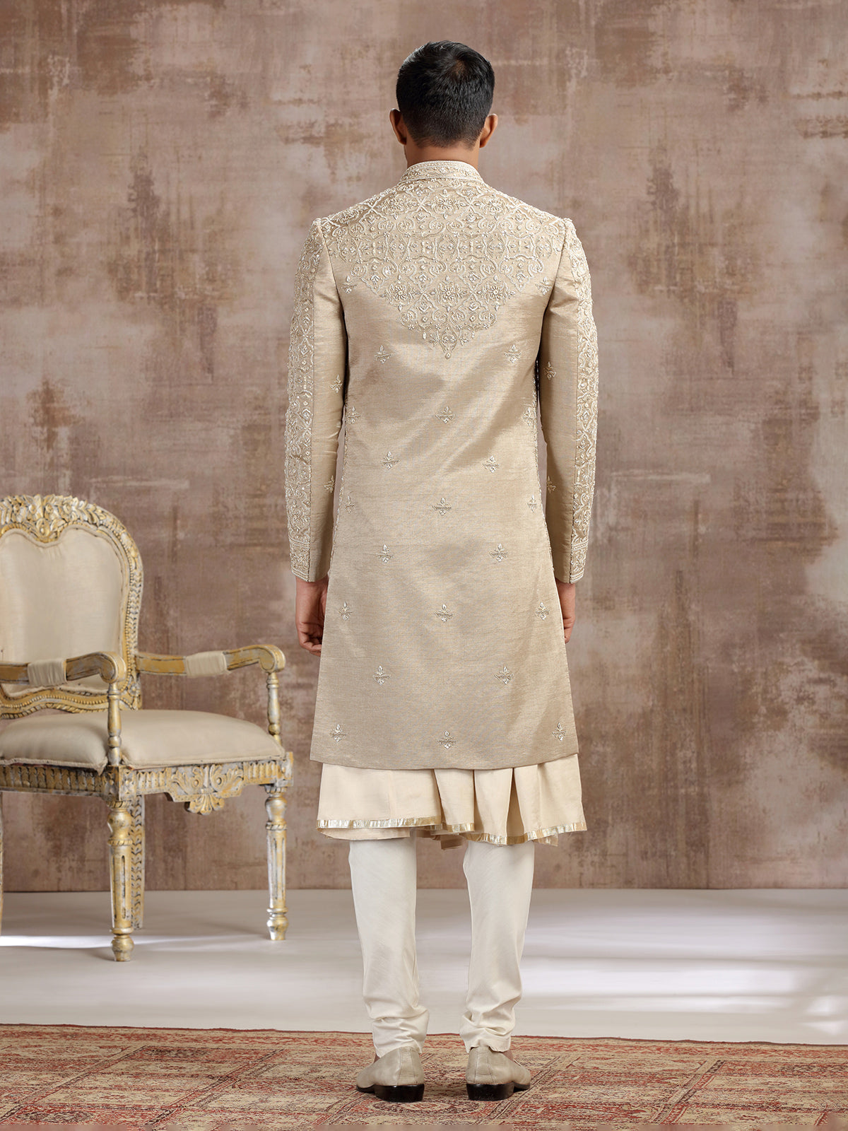 Gold silk peshwai sherwani with subtle shine