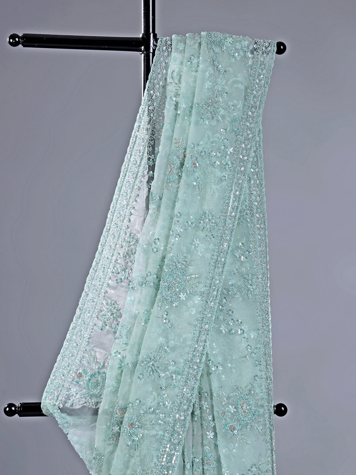 Light green organza saree with beaded detailing