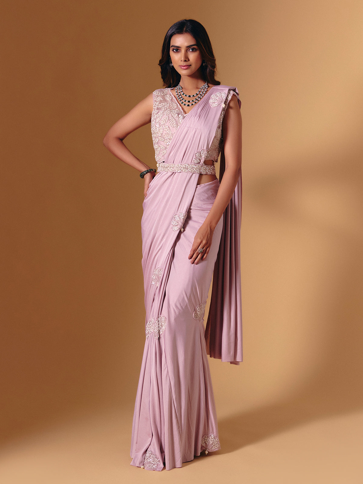Light pink lycra saree with shimmering pearl accents