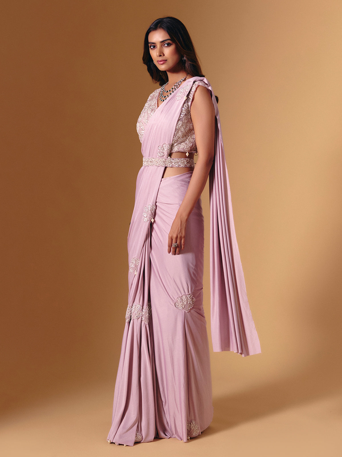 Light pink lycra saree with shimmering pearl accents